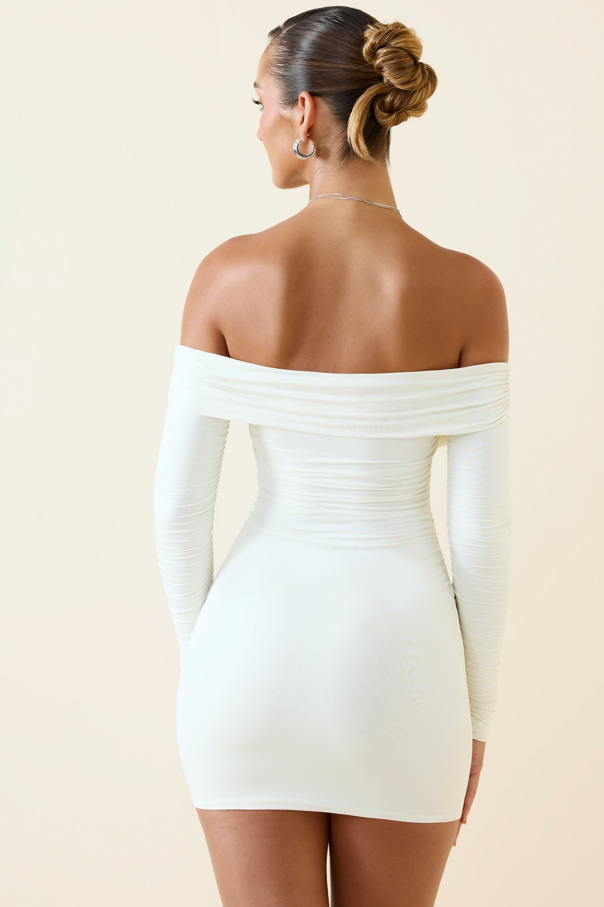 Aarti Off-Shoulder Ruched Bodycon Mini Dress in Vanilla | Oh Polly Aarti Off-Shoulder Ruched Bodycon Mini Dress in Vanilla | Oh Polly
