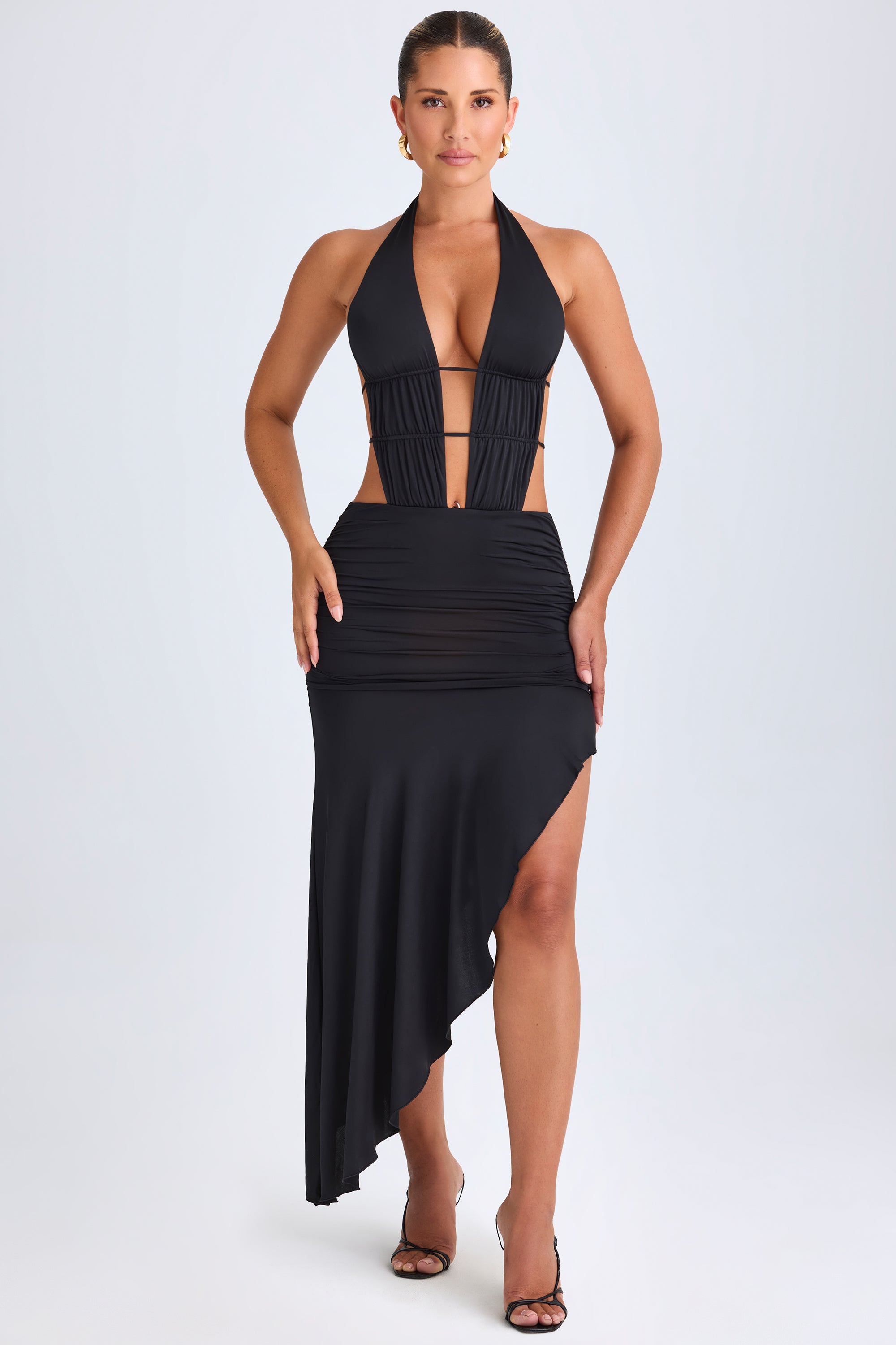 Manami Asymmetric Cut-Out Halterneck Midaxi Dress in Black | Oh Polly Manami Asymmetric Cut-Out Halterneck Midaxi Dress in Black | Oh Polly