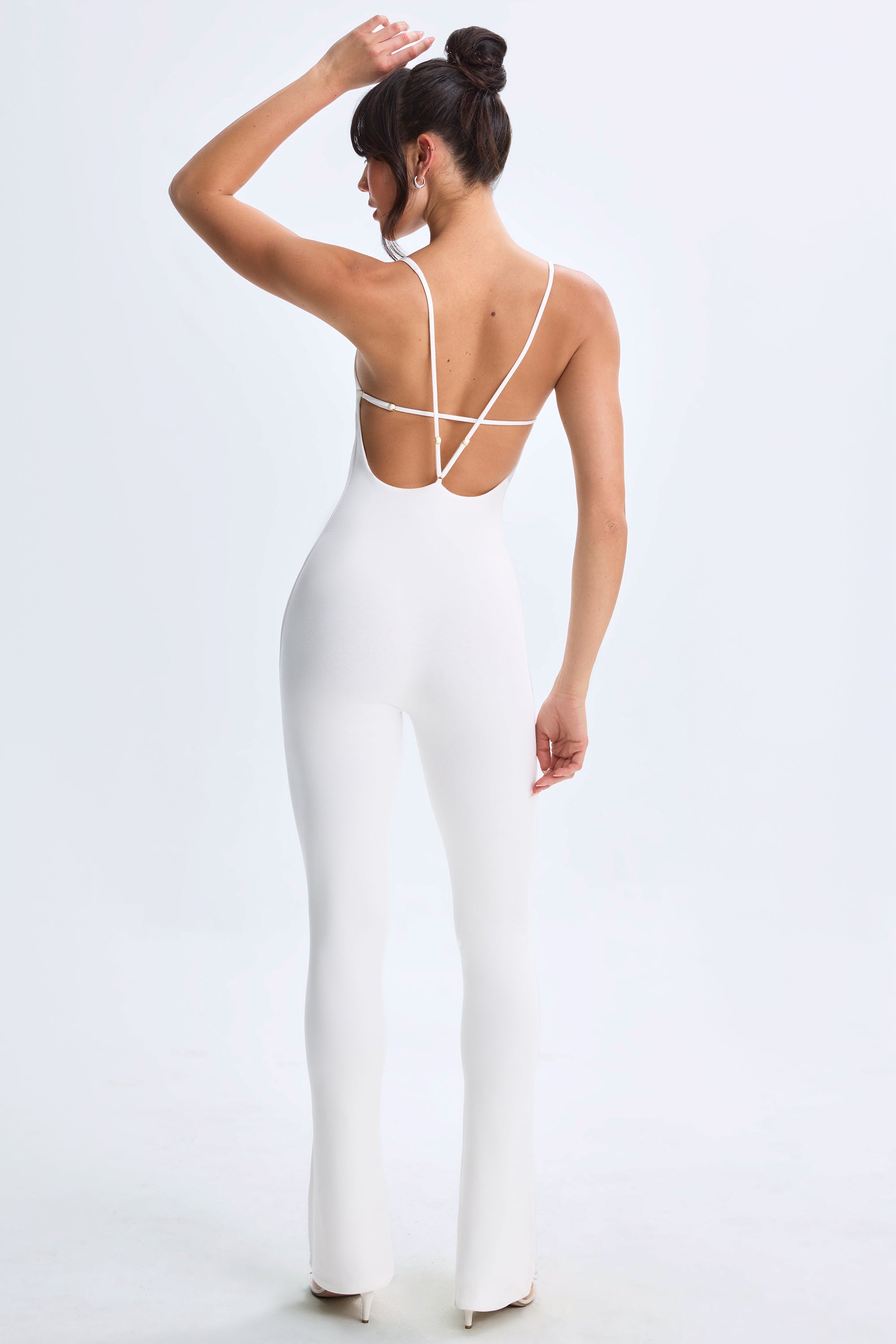Plunge Open-Back Flared Jumpsuit in White | Oh Polly