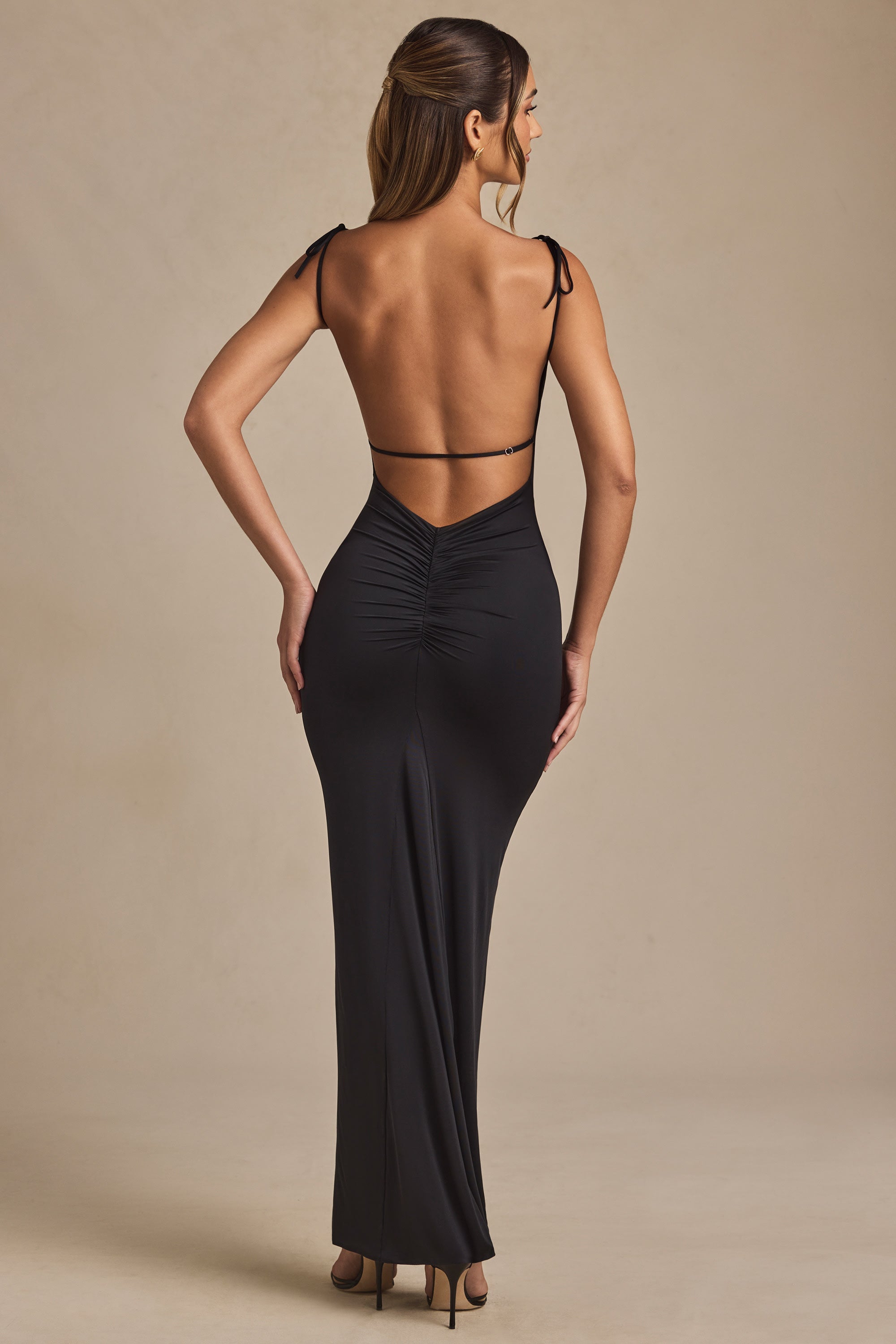 Devika Ruched Open-Back Maxi Dress in Black | Oh Polly