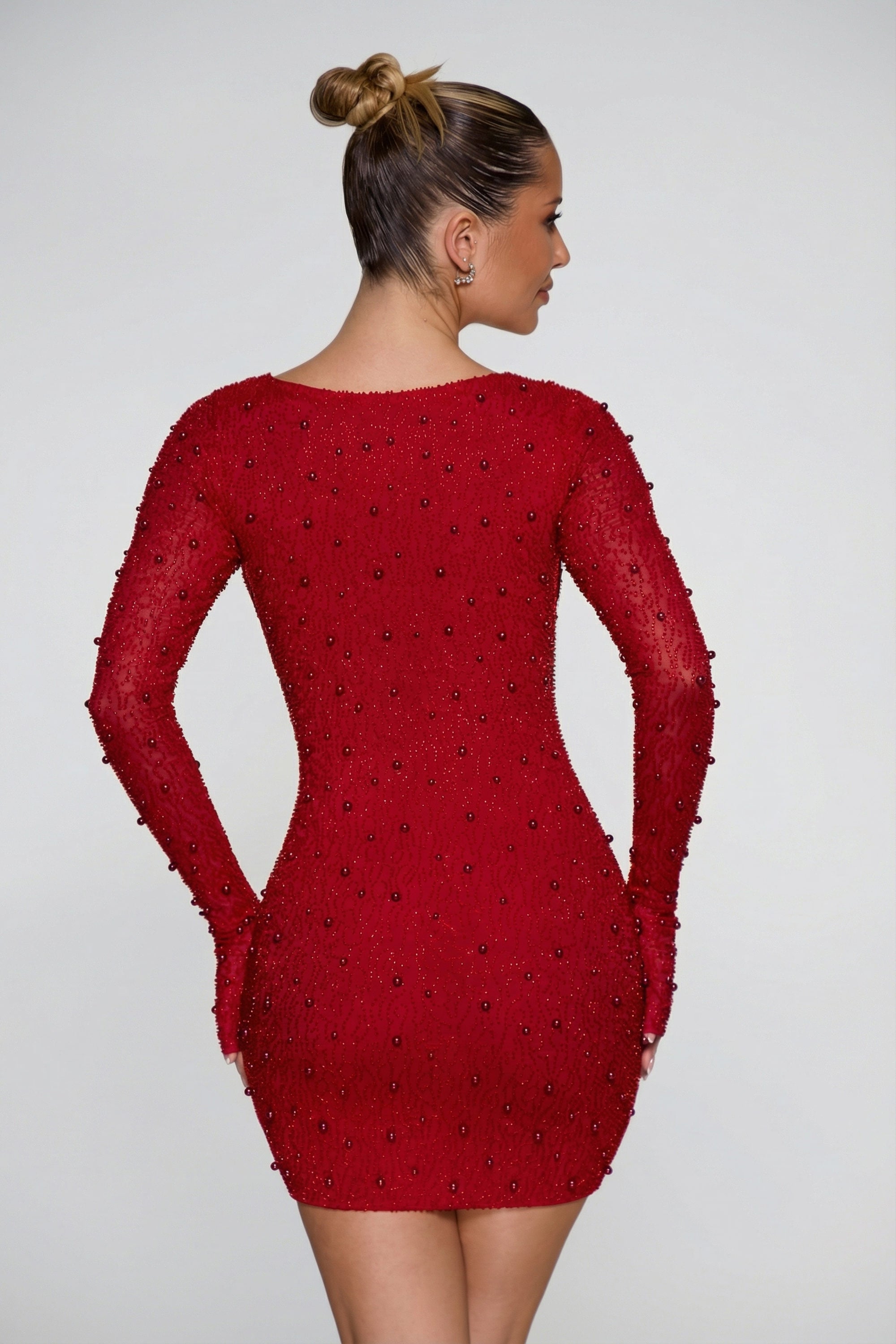 embellished long sleeve mini dress in red Beatriz Red Embellished Tassel Long Sleeve Bandage Mini Dress  Mara Blak