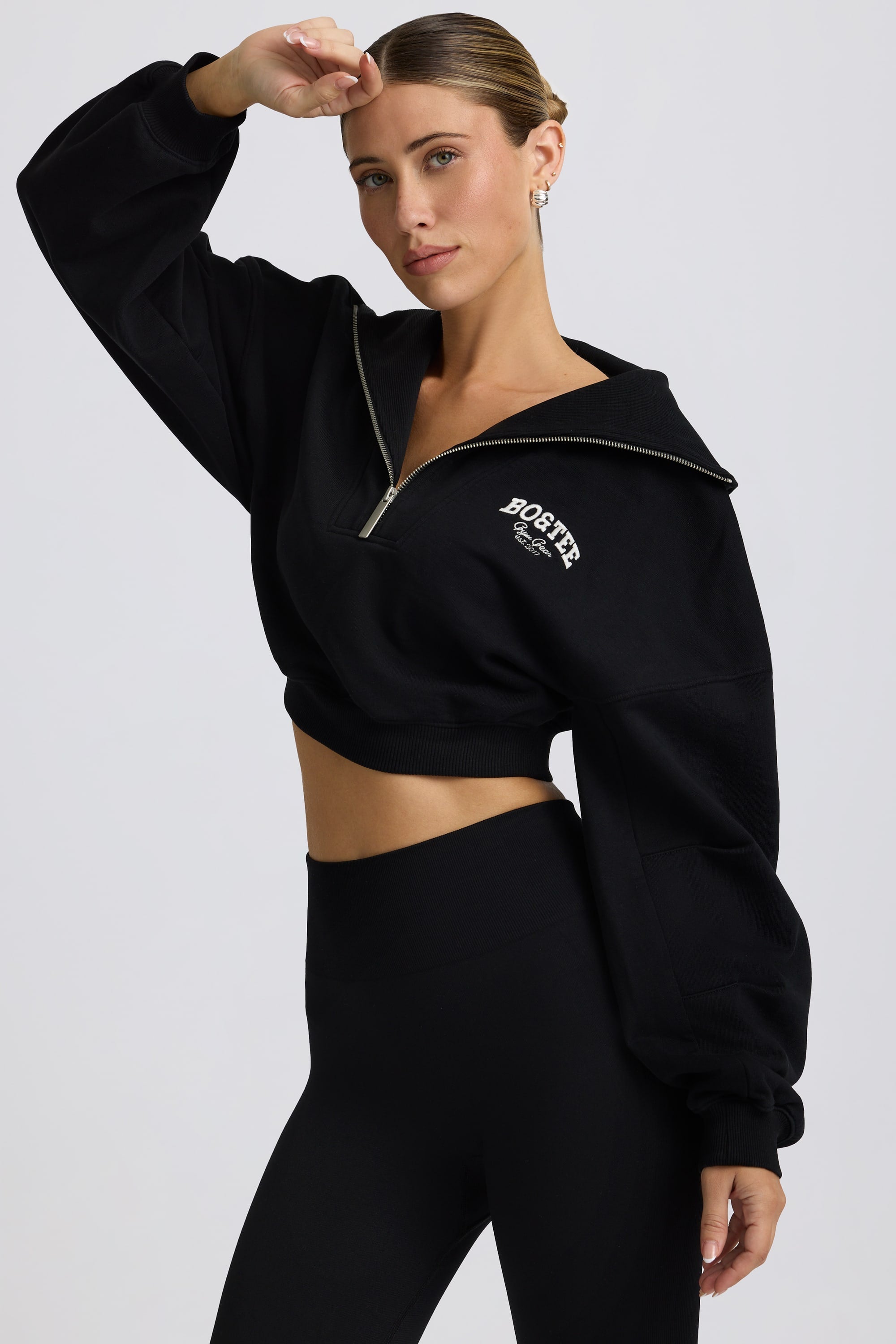 Quarter-Zip Cropped Sweatshirt in Black Oh Polly