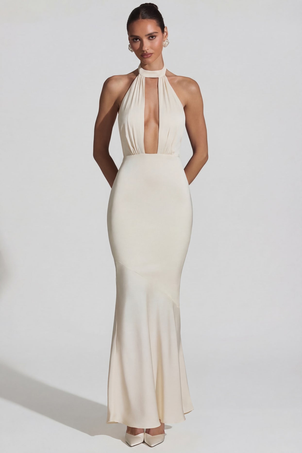 Oh Polly's Priscilla wearing the Desiree Gown Length Dress in Ivory Satin fabric perfect for glamorous red carpet