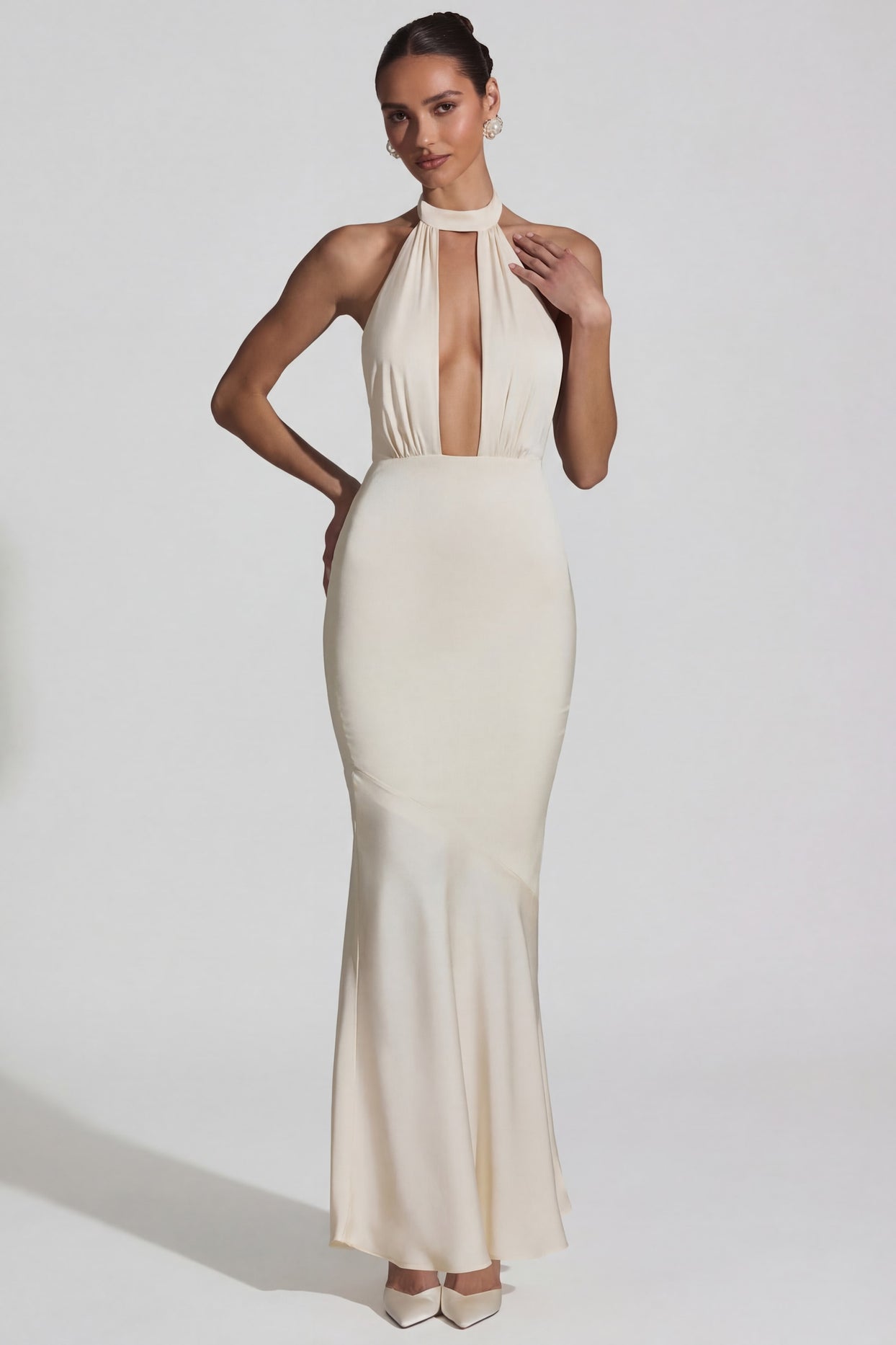 Oh Polly's Priscilla wearing the Desiree Gown Length Dress in Ivory Satin fabric perfect for luxury gala nights