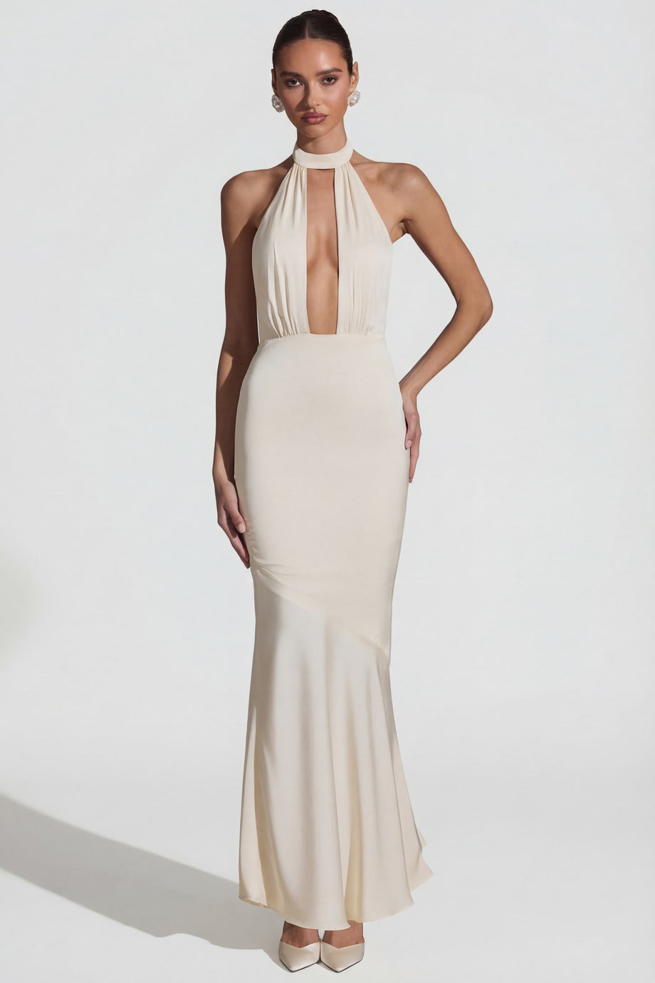 Oh Polly's Priscilla wearing the Desiree Gown Length Dress in Ivory Satin fabric perfect for chic cocktail soirees