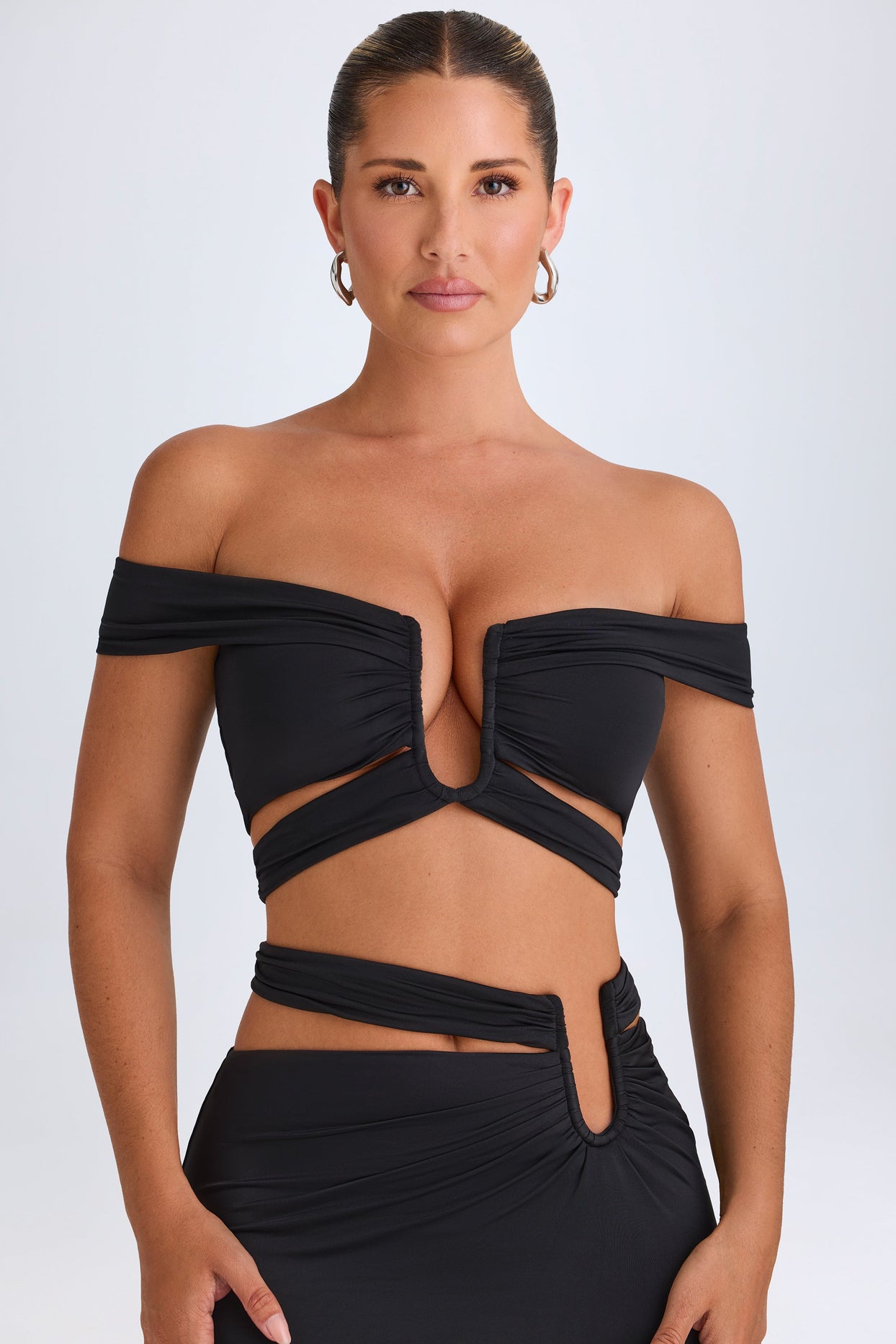 Cut-Out Off-Shoulder Crop Top in Black - 8