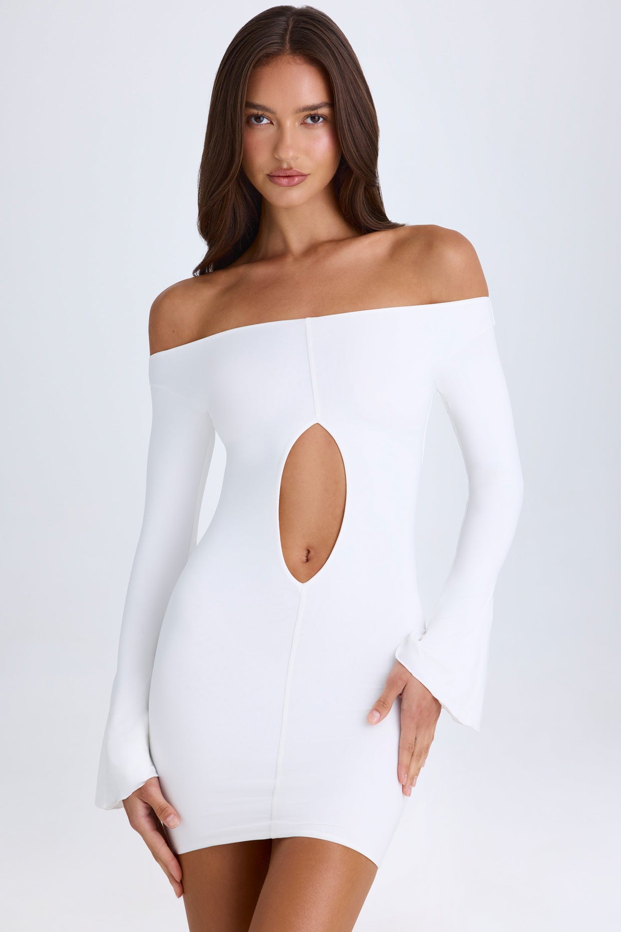 Off-Shoulder Cut-Out Mini Dress in White Off-Shoulder Cut-Out Mini Dress in White