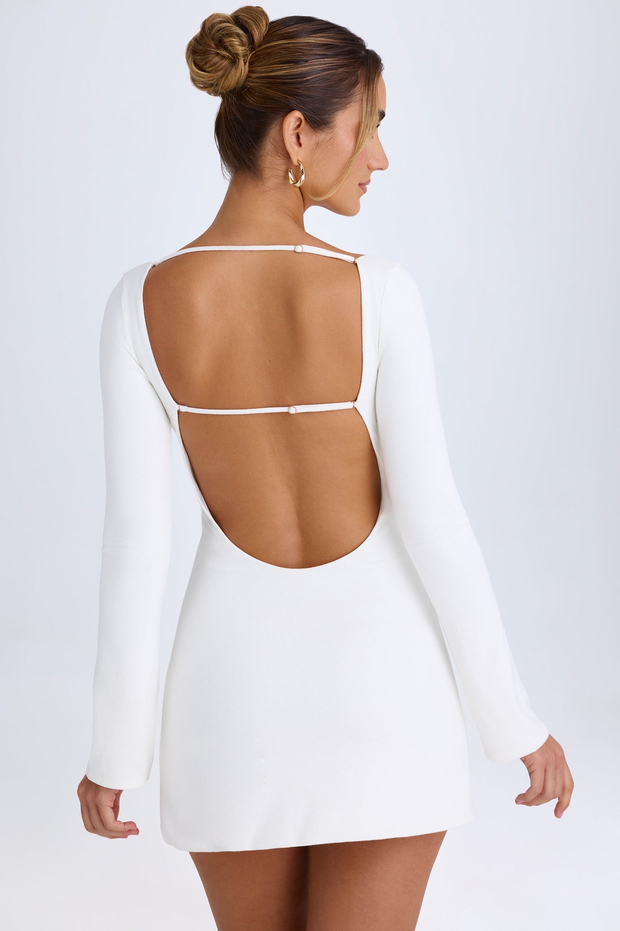 Cut-Out Long-Sleeve Mini Dress in White Cut-Out Long-Sleeve Mini Dress in White