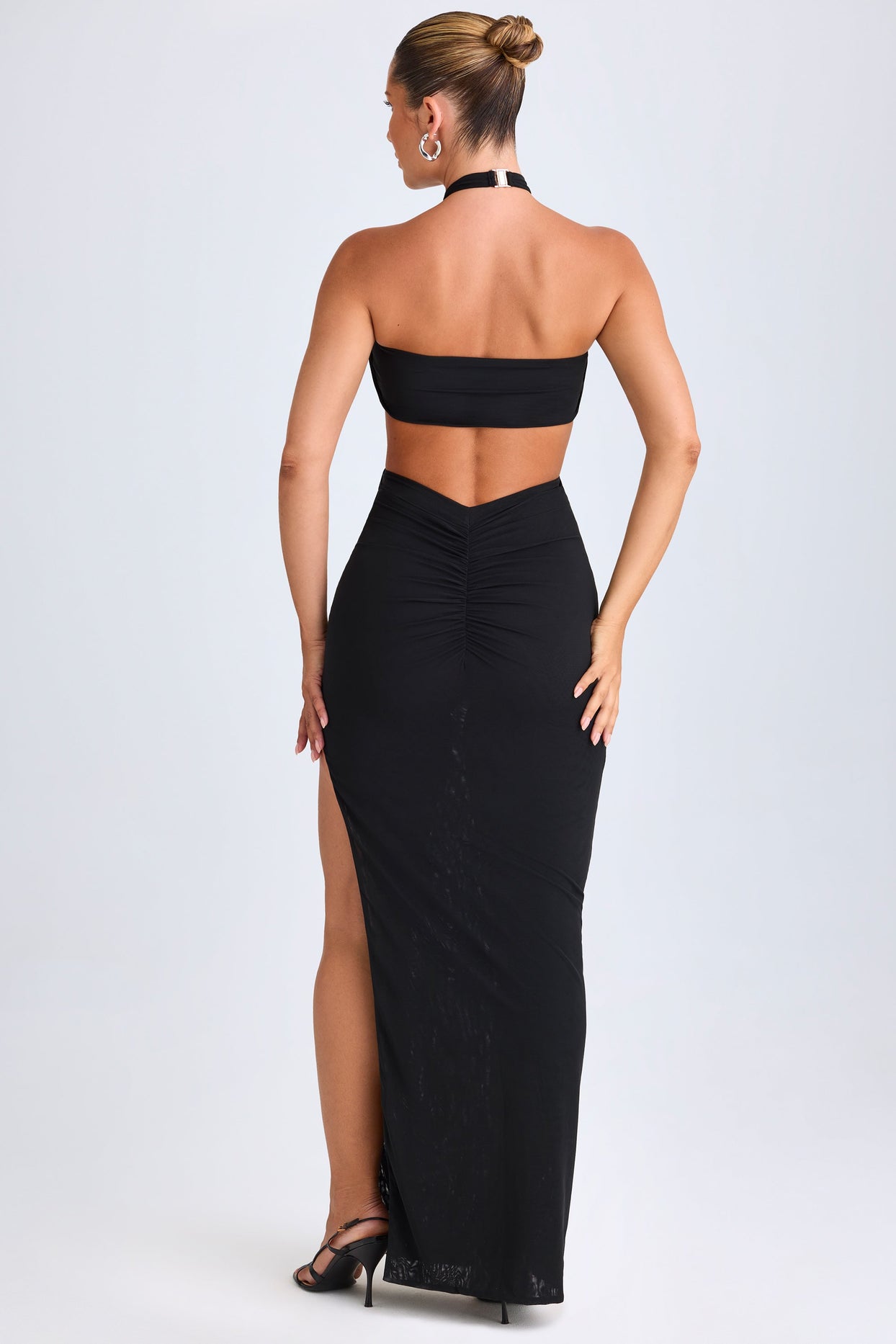 Bethania Hardware Detail Cut-Out Halterneck Maxi Dress in Black | Oh Polly Bethania Hardware Detail Cut-Out Halterneck Maxi Dress in Black | Oh Polly