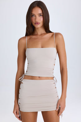 Ruched Cut-Out Mini Skirt in Taupe