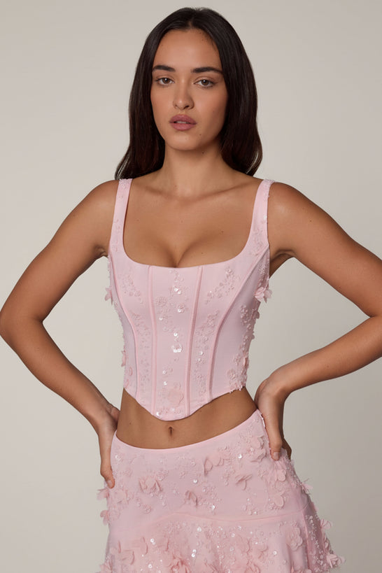 Oh Polly's Roberta wearing the Letitia Corset Top in Ballet Pink Embellished fabric perfect for romantic date nights