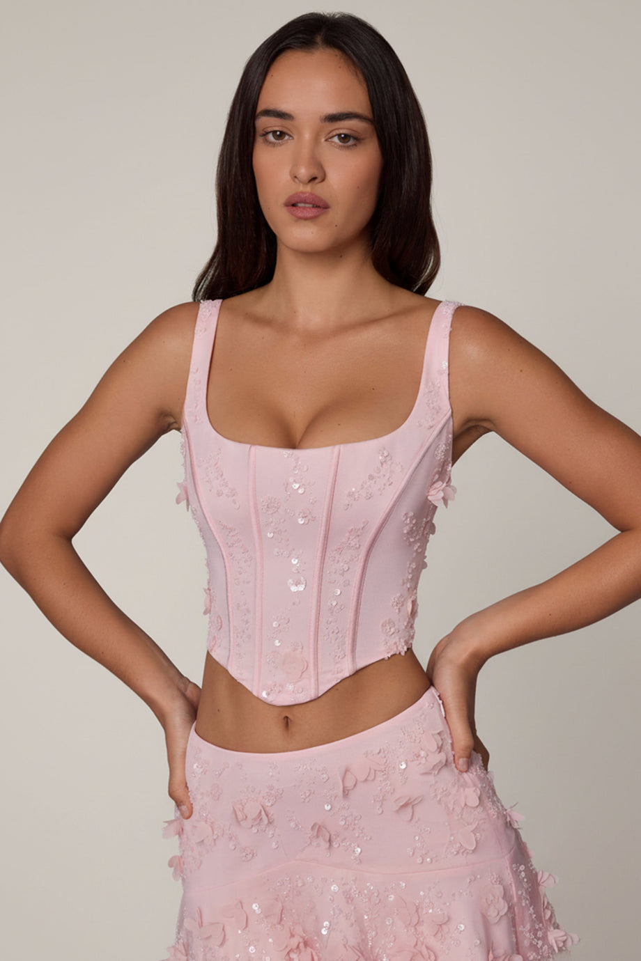 Oh Polly's Roberta wearing the Letitia Corset Top in Ballet Pink Embellished fabric perfect for romantic date nights
