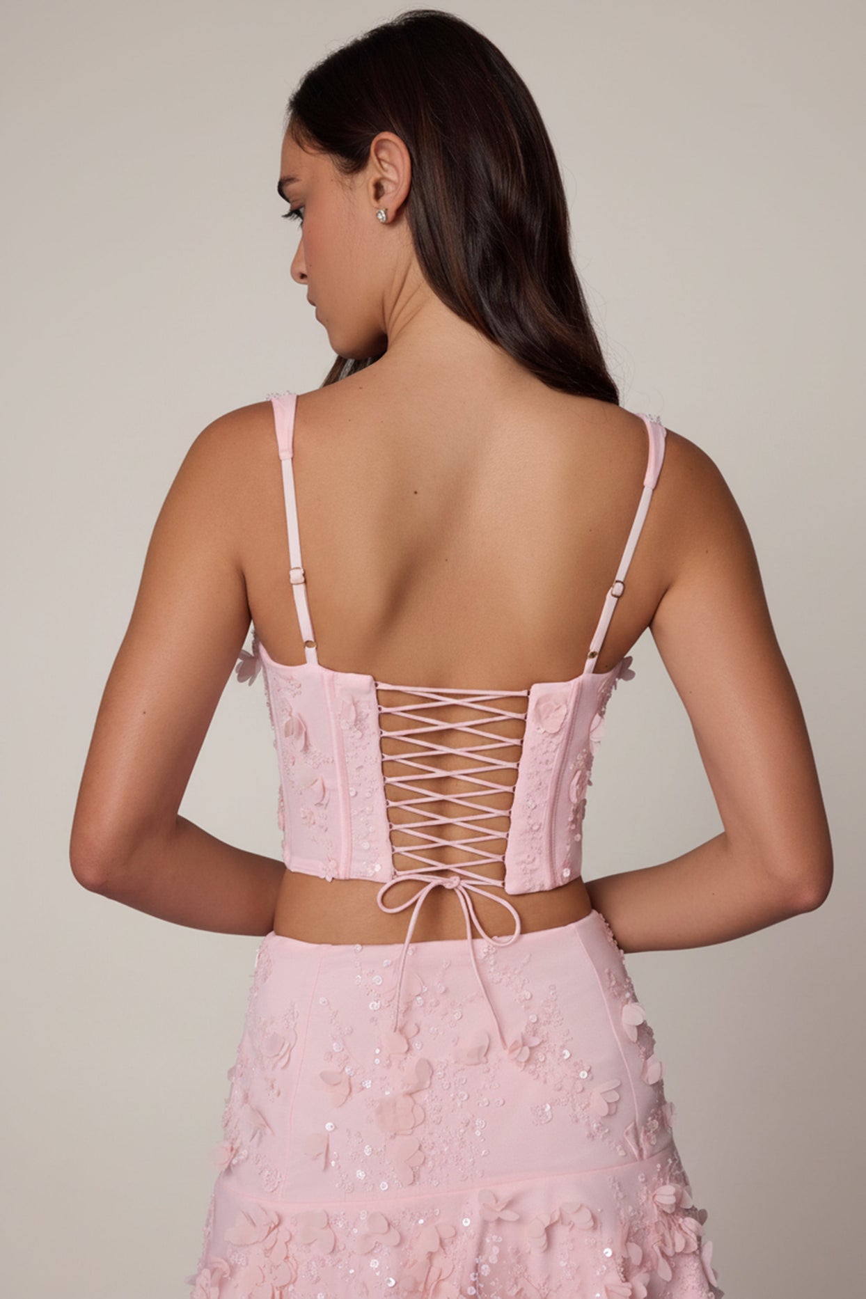 Oh Polly's Roberta wearing the Letitia Corset Top in Ballet Pink Embellished fabric perfect for romantic date nights