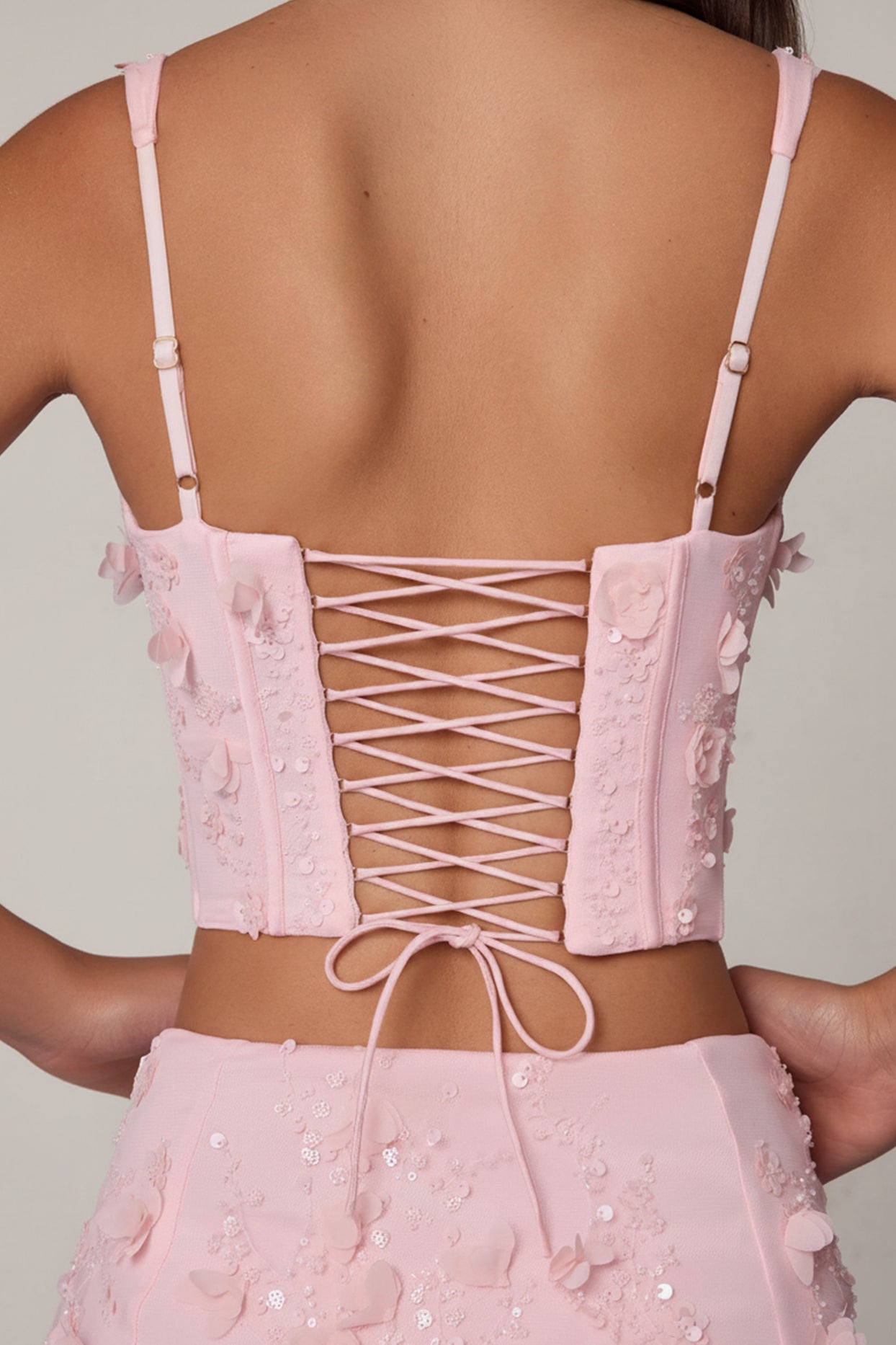 Oh Polly's Roberta wearing the Letitia Corset Top in Ballet Pink Embellished fabric perfect for chic cocktail parties