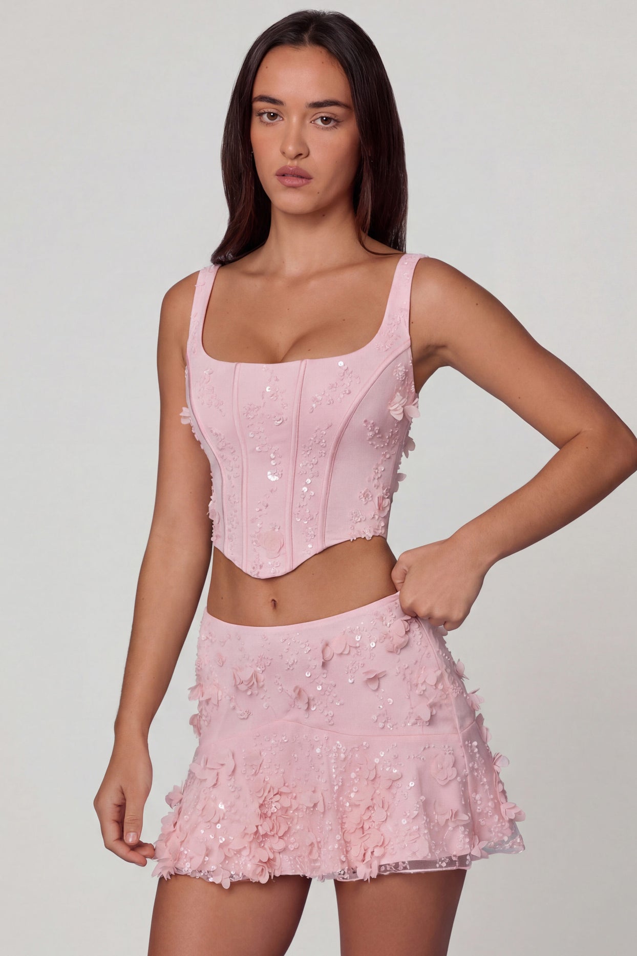 Oh Polly's Roberta wearing the Letitia Corset Top in Ballet Pink Embellished fabric perfect for romantic date nights