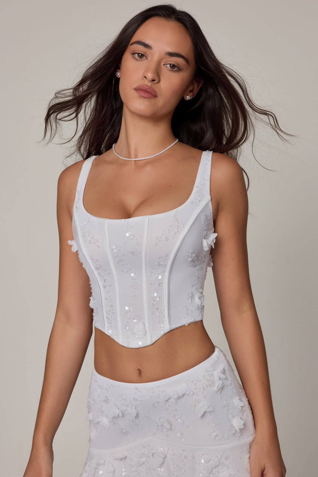 Oh Polly's Roberta wearing the Letitia Corset Top in White Embellished fabric perfect for summer parties