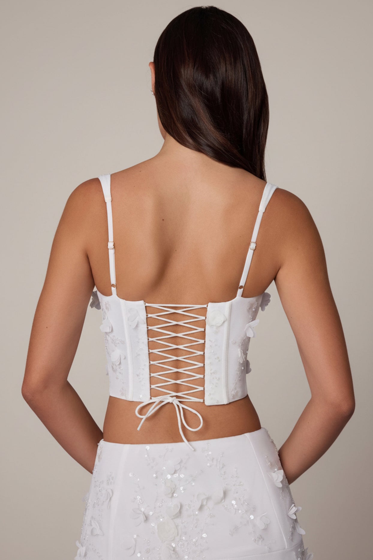 Oh Polly's Roberta wearing the Letitia Corset Top in White Embellished fabric perfect for summer parties