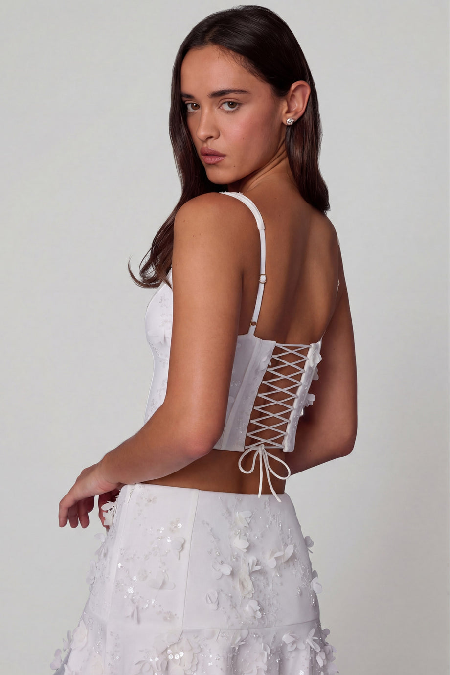 Oh Polly's Roberta wearing the Letitia Corset Top in White Embellished fabric perfect for summer parties