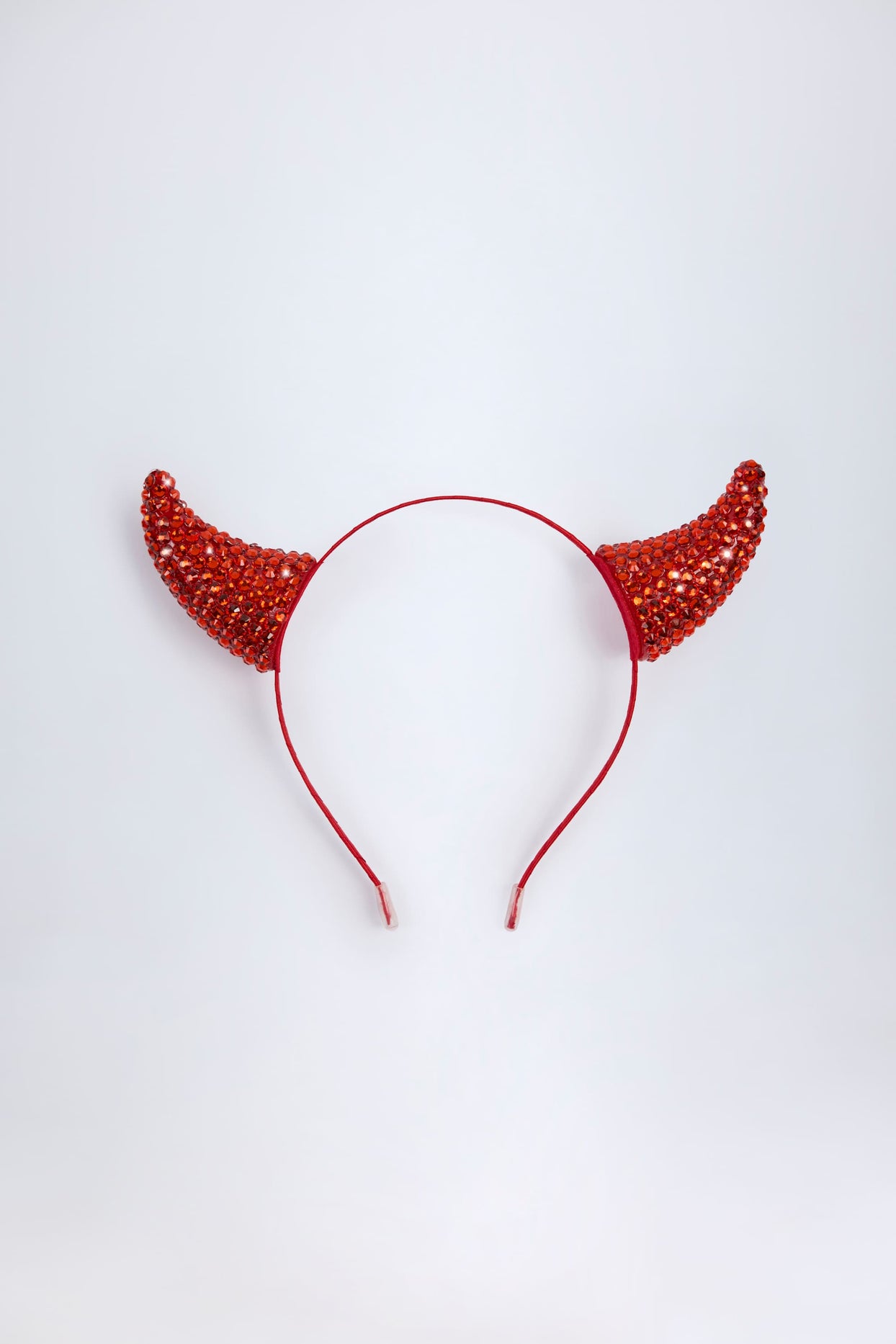 عصابة رأس بقرون الشيطان باللون الأحمر الناري