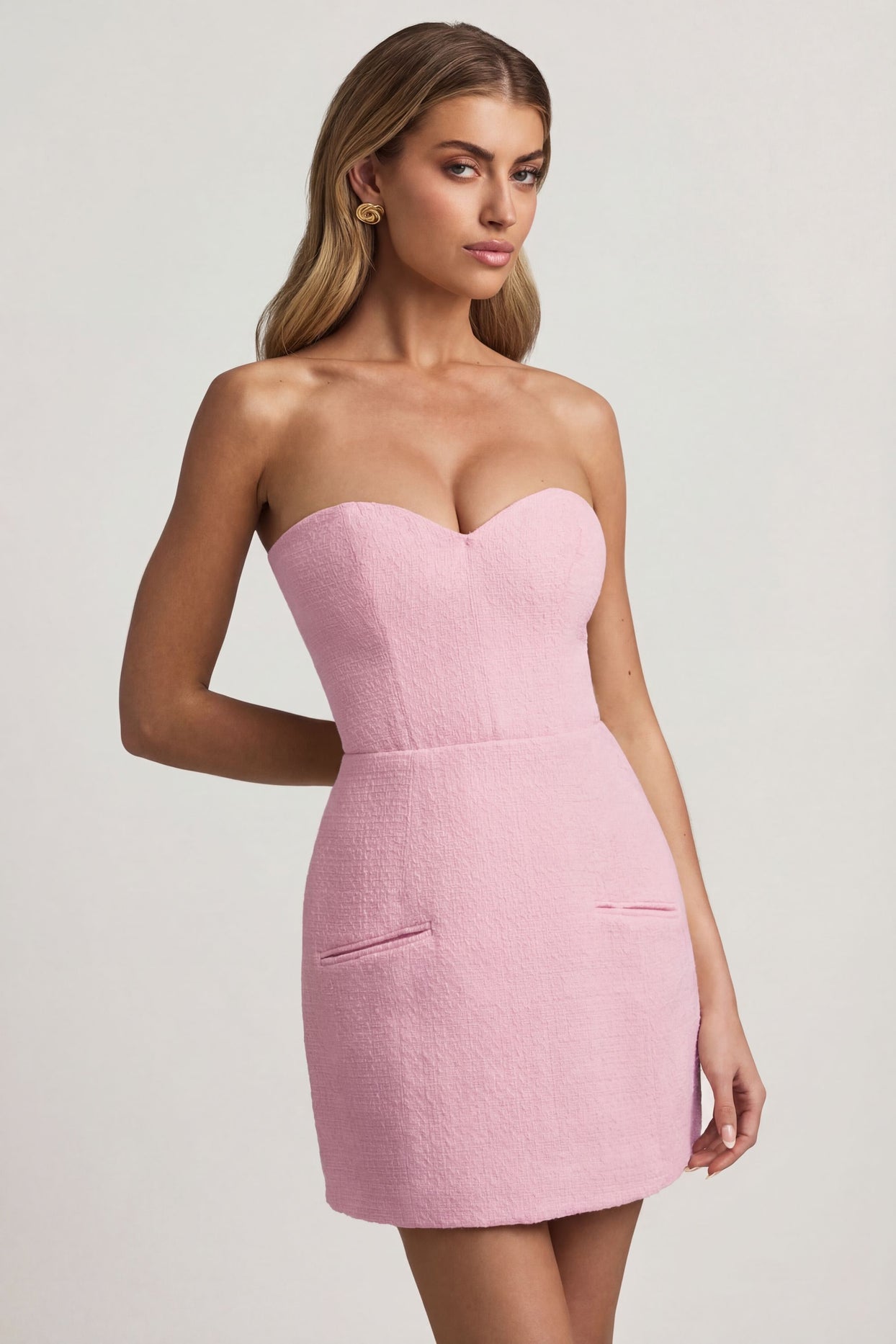 Oh Polly's Freya Tidy wearing the Talina Mini Dress in Soft Pink Tweed fabric perfect for date nights