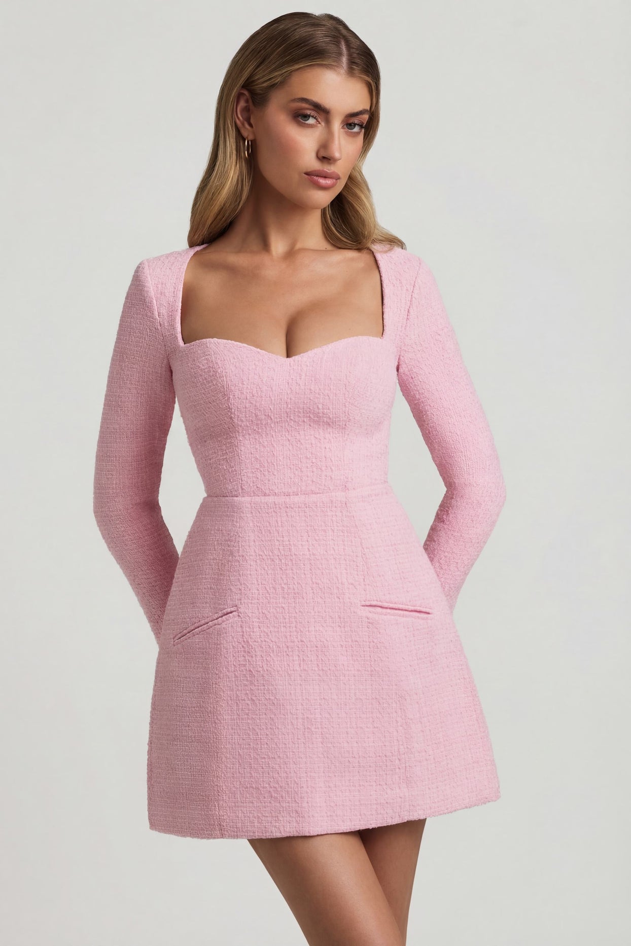 Oh Polly's Freya Tidy wearing the Tacita Mini Dress in Soft Pink Tweed fabric perfect for afternoon tea dates