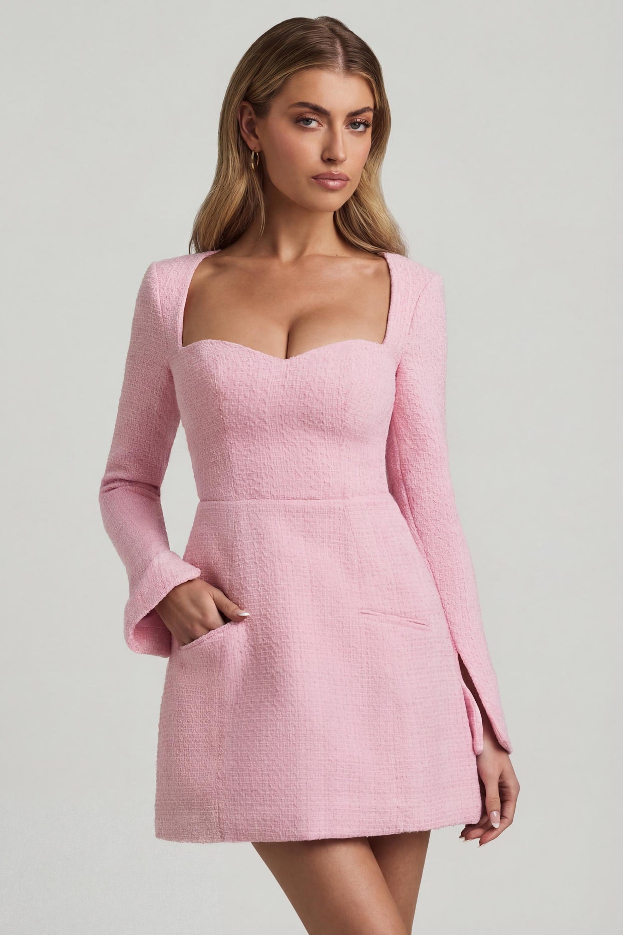Oh Polly's Freya Tidy wearing the Tacita Mini Dress in Soft Pink Tweed fabric perfect for birthday celebrations