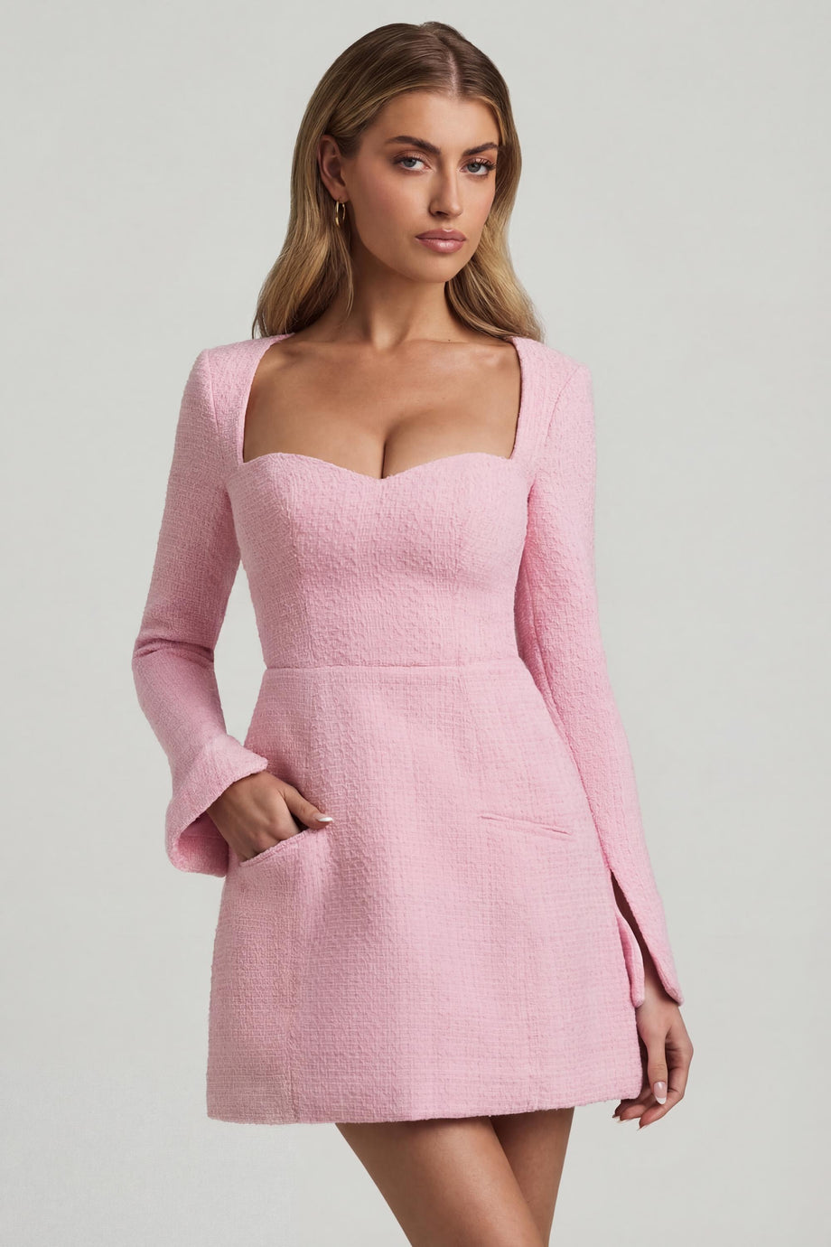 Oh Polly's Freya Tidy wearing the Tacita Mini Dress in Soft Pink Tweed fabric perfect for birthday celebrations