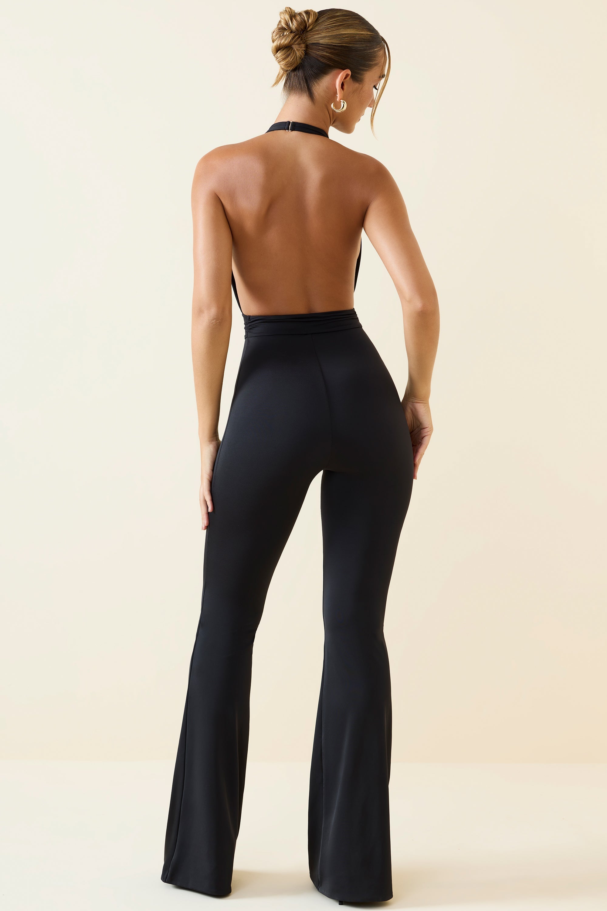 Halterneck Cut-Out Flared Jumpsuit in Black