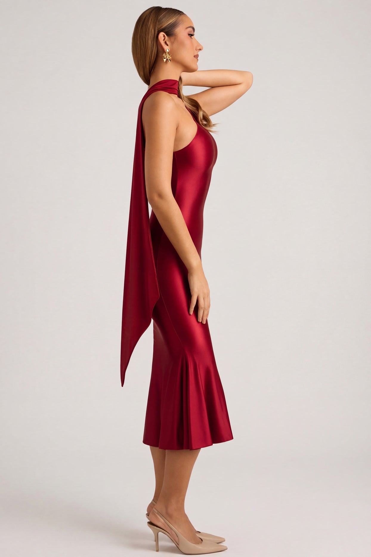 Oh Polly's Priscilla wearing the Shaya Midaxi Dress in True Red Satin Jersey fabric perfect for romantic date nights