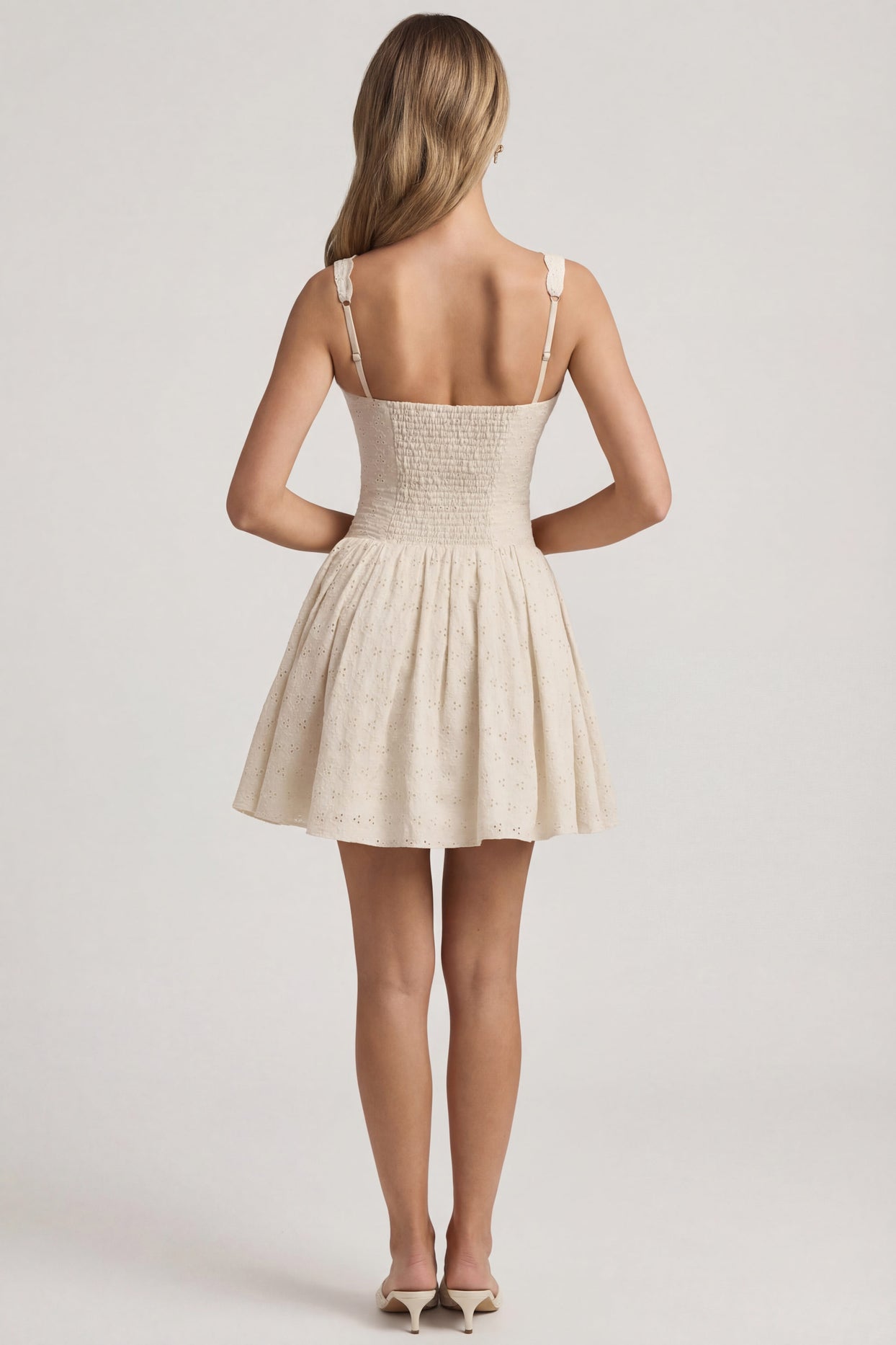 Oh Polly's Freya Tidy wearing the Sabina Mini Dress in Ivory Woven fabric perfect for summer garden parties