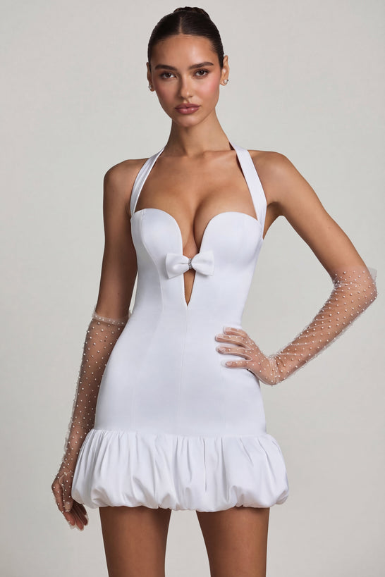 Oh Polly's Anna wearing the Millie Mini Dress in White Recycled Satin fabric perfect for cocktail evenings