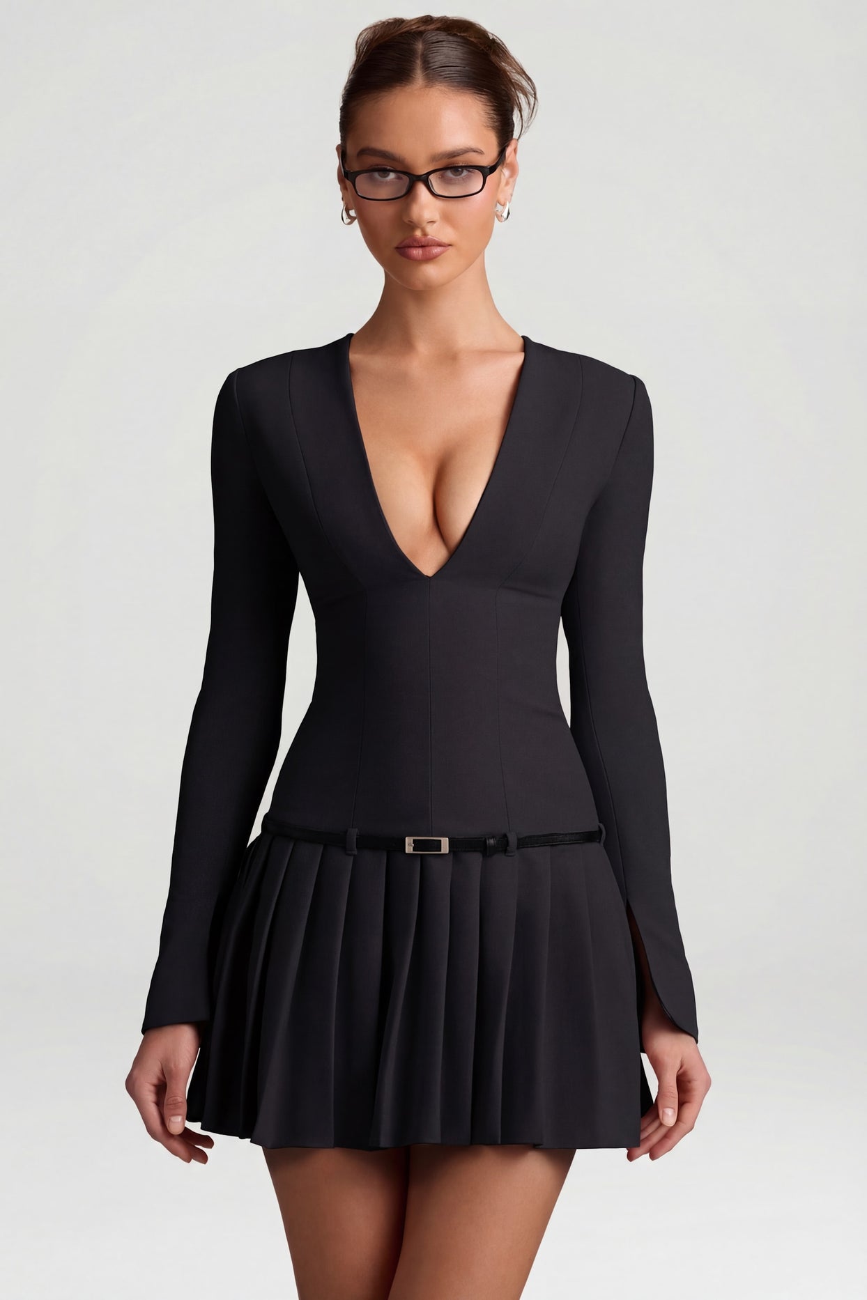 Oh Polly's Anna wearing the Fiorella Mini Dress in Black Stretch Woven fabric perfect for a night out