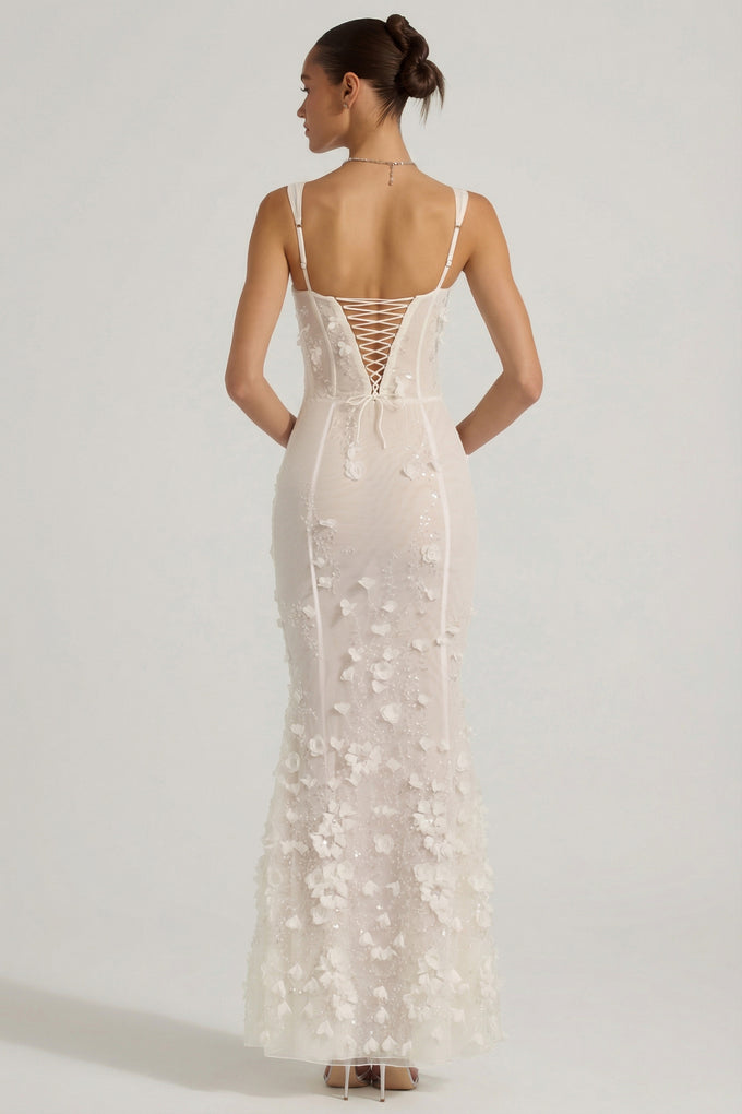 Oh Polly model Anna wearing the Vasanta Gown Length Dress in White Embellished fabric perfect for summer weddings