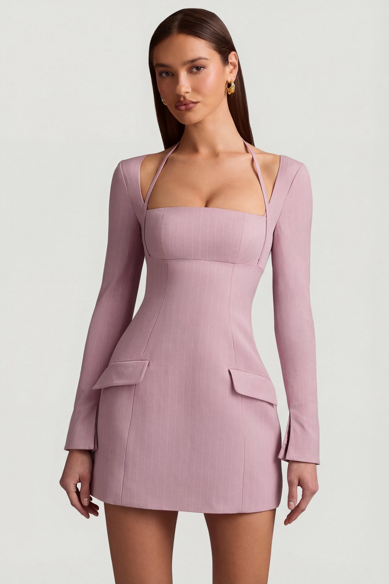 Oh Polly's Anna wearing the Ksenia Mini Dress in Mauve Stretch Woven fabric perfect for a summer brunch