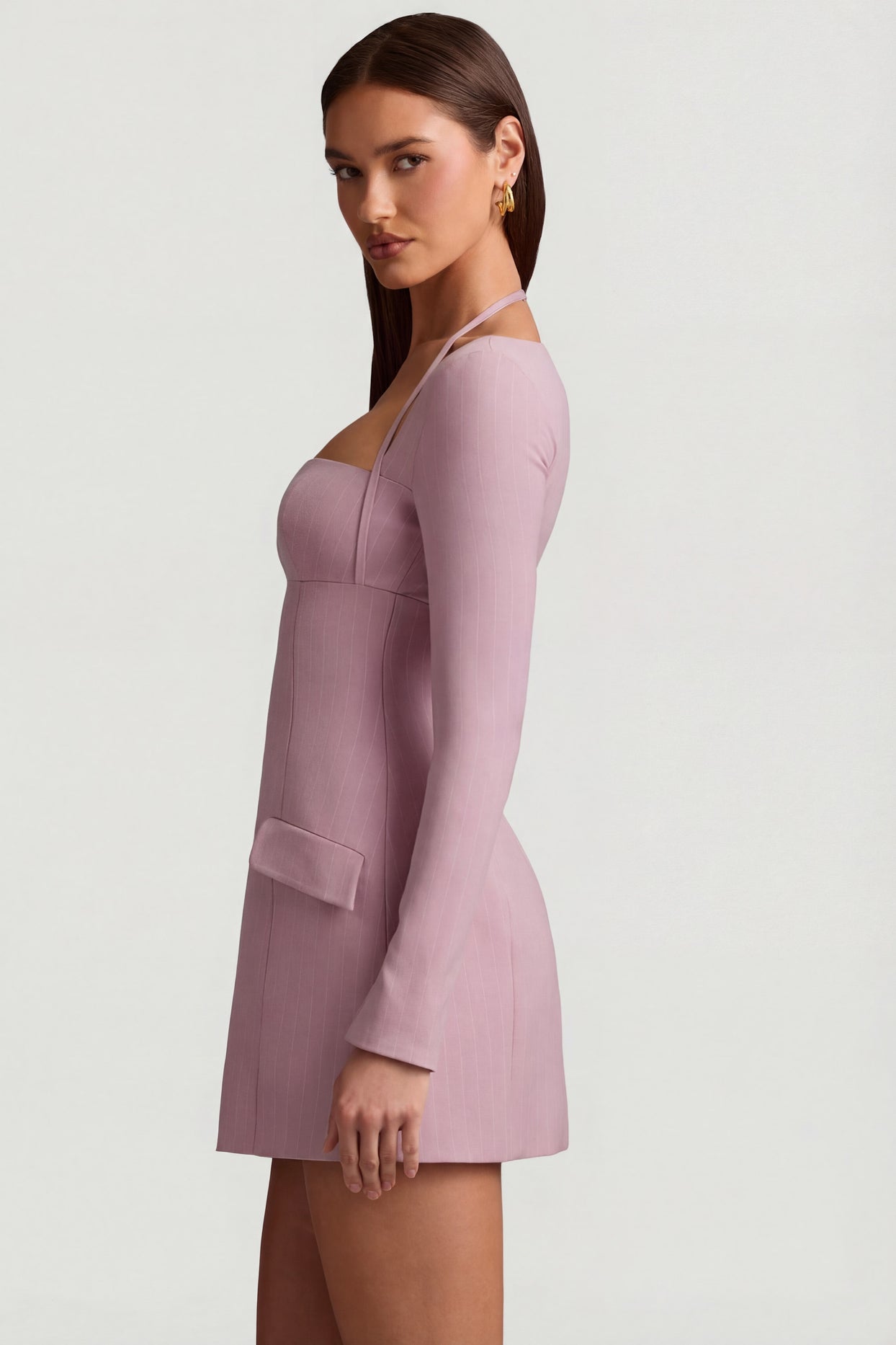 Oh Polly's Anna wearing the Ksenia Mini Dress in Mauve Stretch Woven fabric perfect for a summer brunch