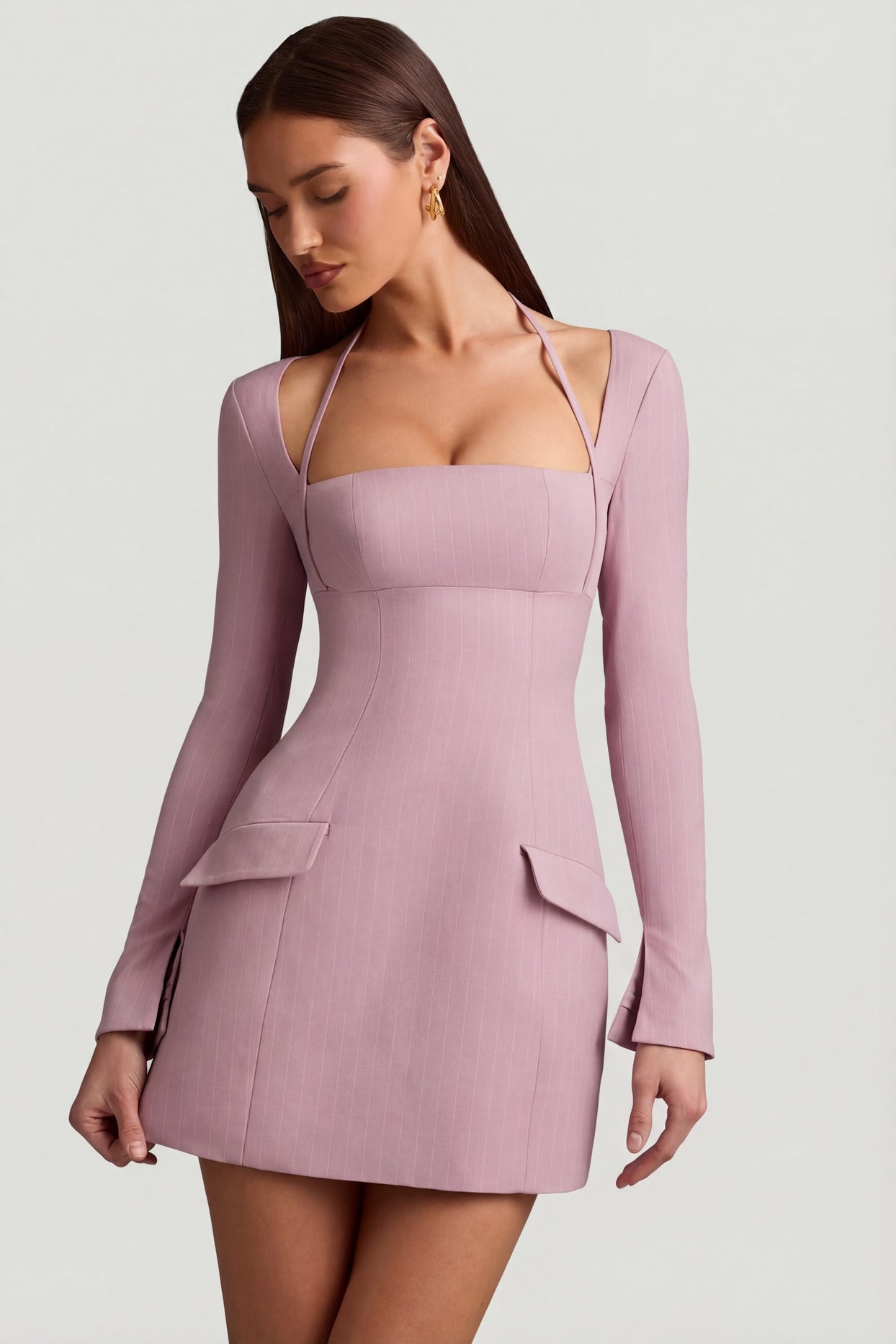 Oh Polly's Anna wearing the Ksenia Mini Dress in Mauve Stretch Woven fabric perfect for a birthday celebration
