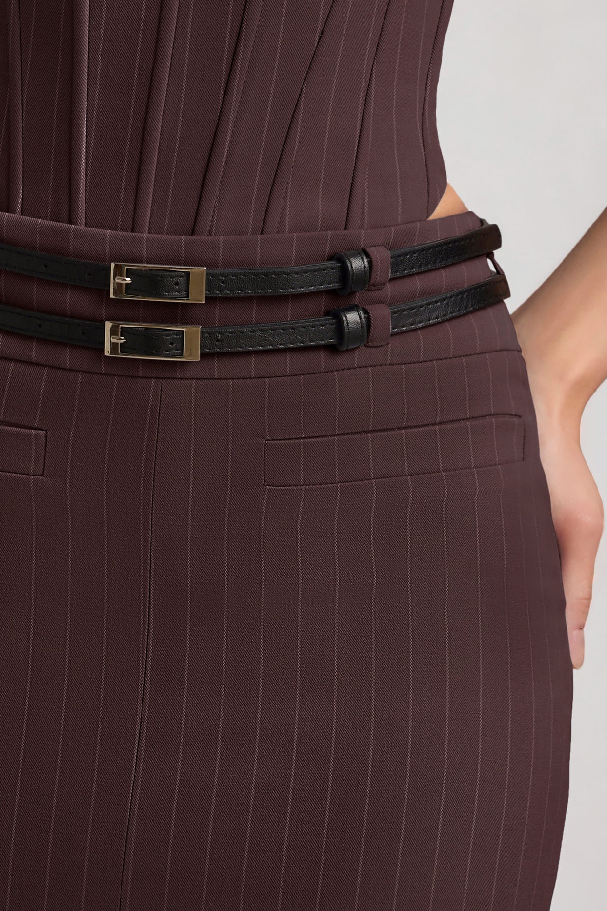 Oh Polly's Anna wearing the Liora Maxi Skirt in Chocolate Brown fabric perfect for evening parties