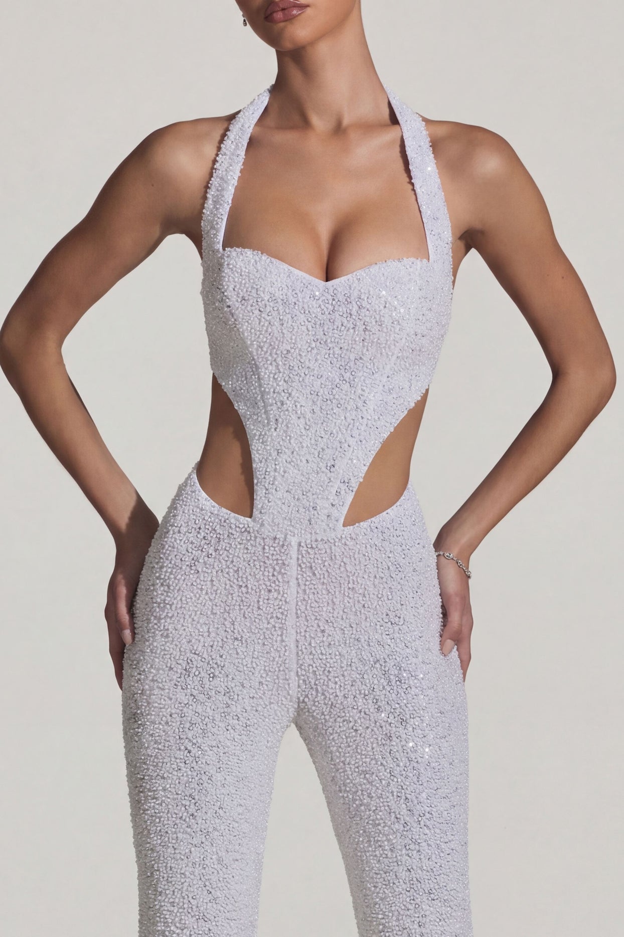 Oh Polly's Anna wearing the Coralena Regular Jumpsuit in White Embellished, Mesh fabric perfect for rooftop dinners