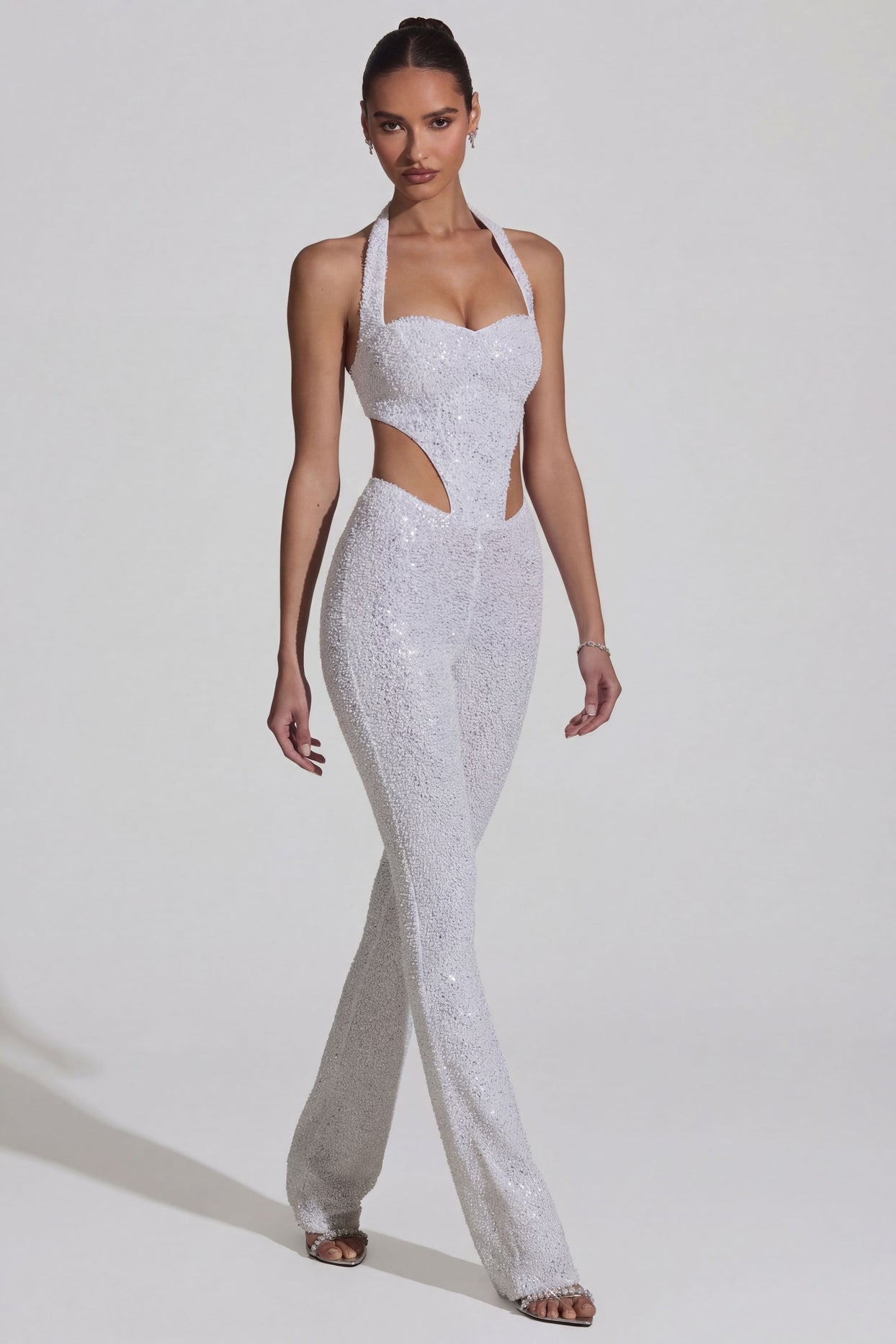 Oh Polly's Anna wearing the Coralena Regular Jumpsuit in White Embellished, Mesh fabric perfect for cocktail evenings