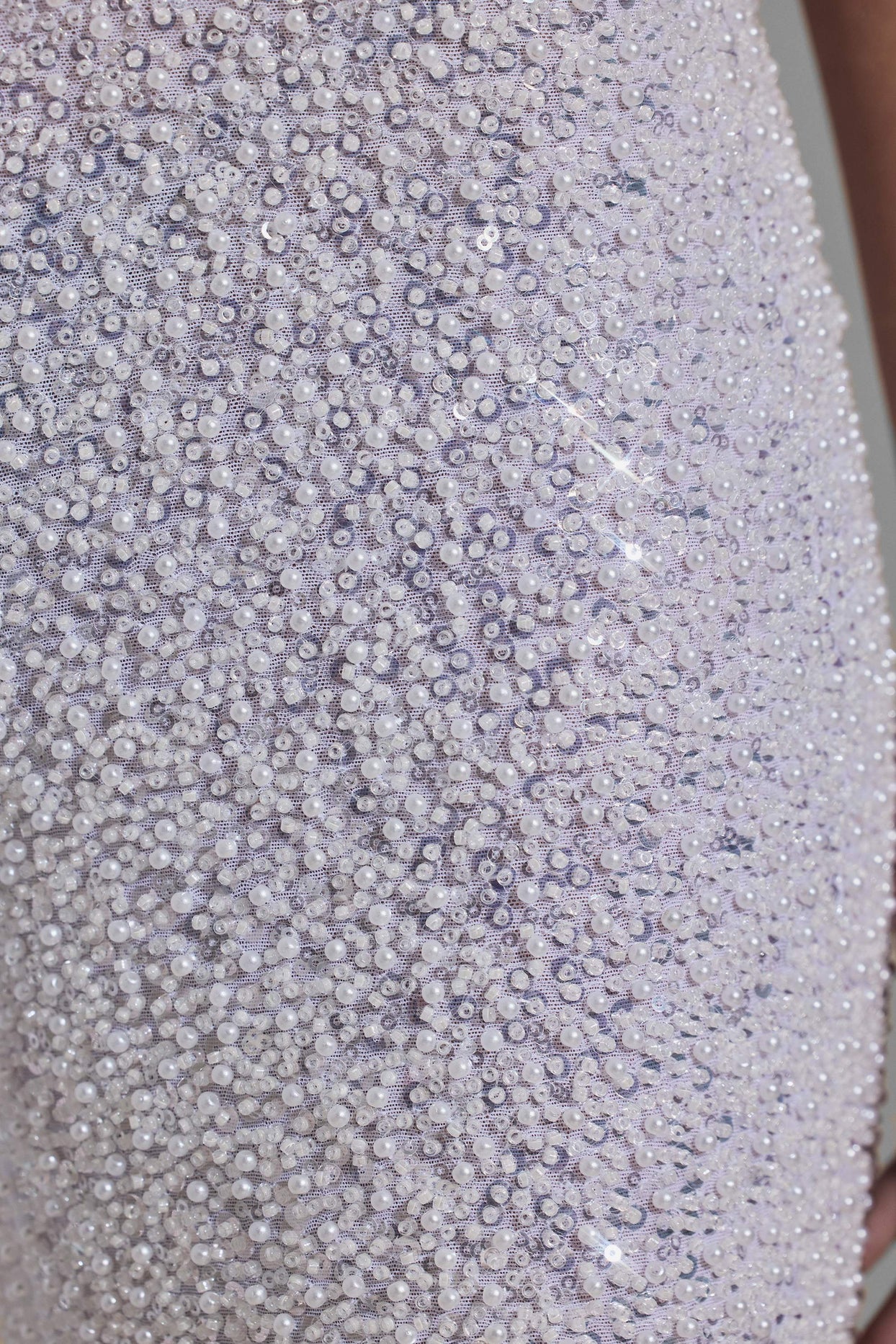 Oh Polly's Anna wearing the Coralena Regular Jumpsuit in White Embellished, Mesh fabric perfect for summer parties