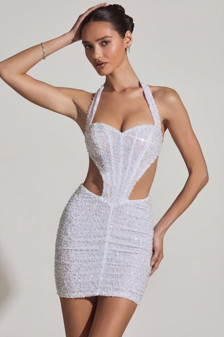 Oh Polly's Anna wearing the Lucia Mini Dress in White Embellished, Mesh fabric perfect for summer garden parties