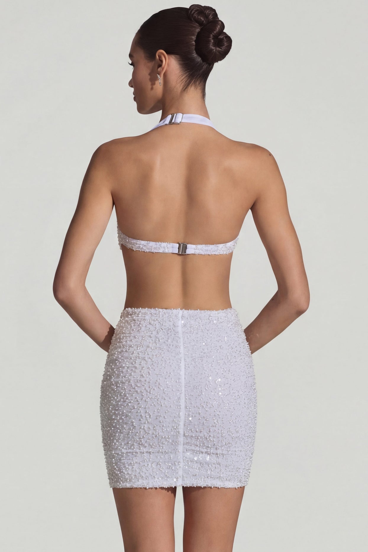 Oh Polly's Anna wearing the Lucia Mini Dress in White Embellished, Mesh fabric perfect for summer garden parties