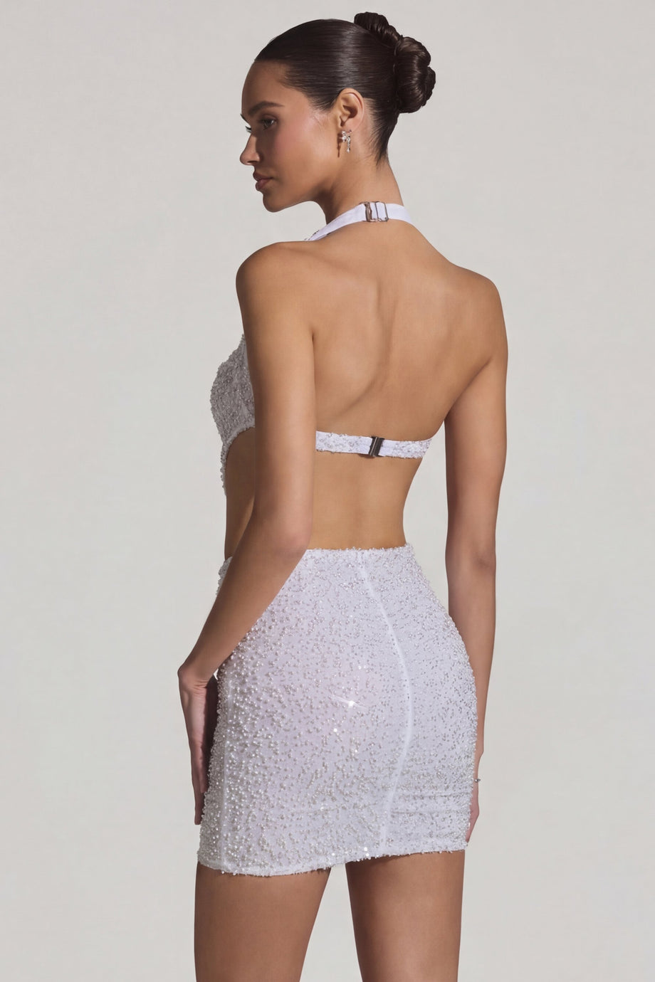 Oh Polly's Anna wearing the Lucia Mini Dress in White Embellished, Mesh fabric perfect for bridal shower events