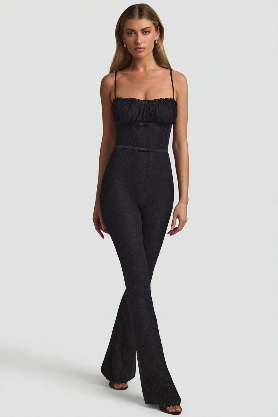 Oh Polly's Freya Tidy wearing the Arlena Regular Jumpsuit in Black Stretch Lace fabric perfect for evening dinners