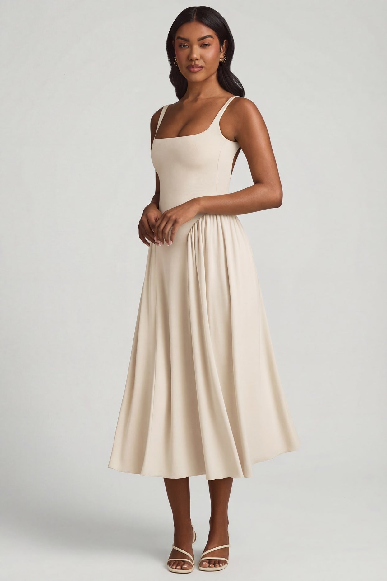 Oh Polly's Yarelis wearing the Aireen Midaxi Dress in Ivory Modal fabric perfect for stylish brunch outings