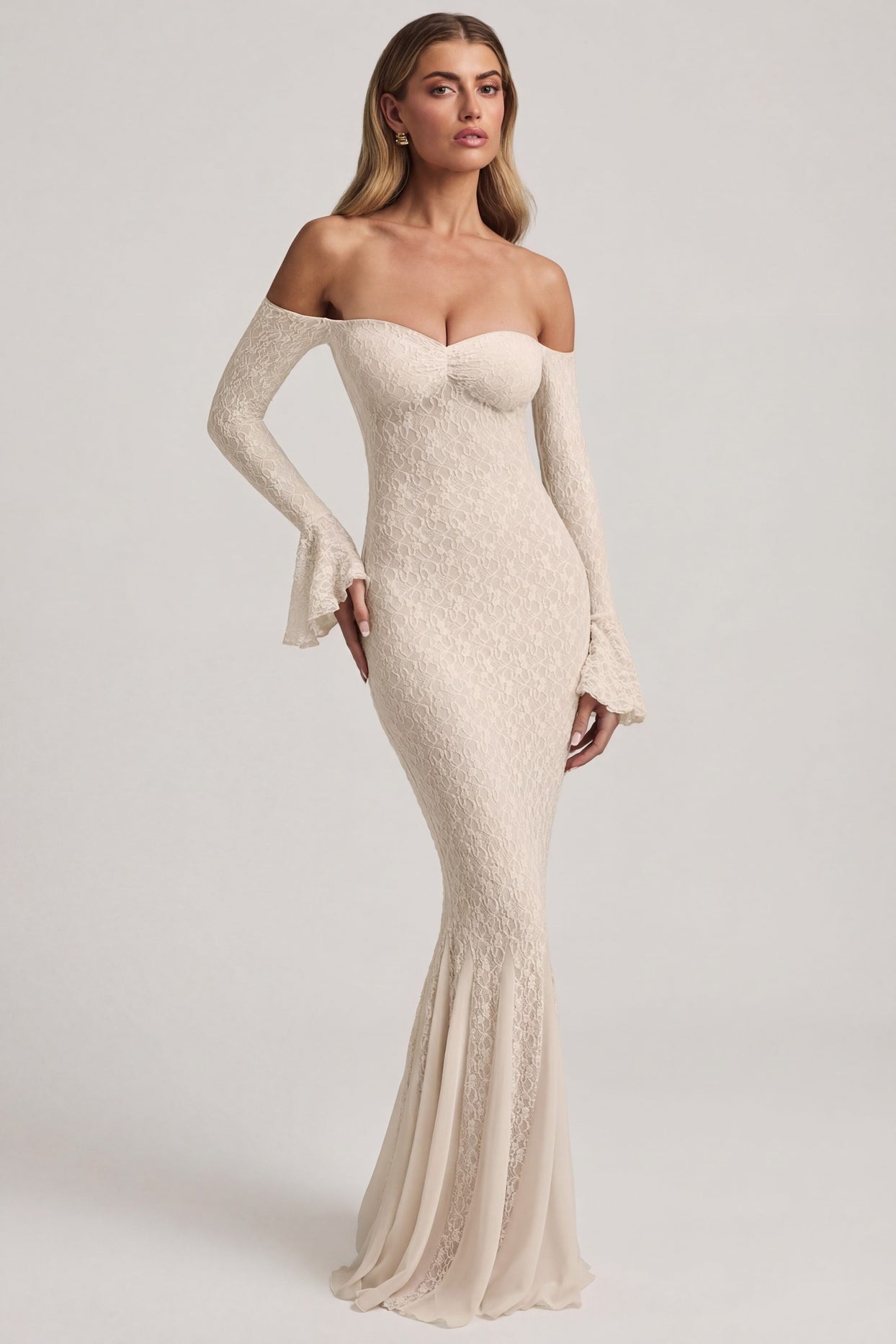 Oh Polly's Freya Tidy wearing the Verena Maxi Dress in Ivory Stretch Lace fabric perfect for summer garden parties