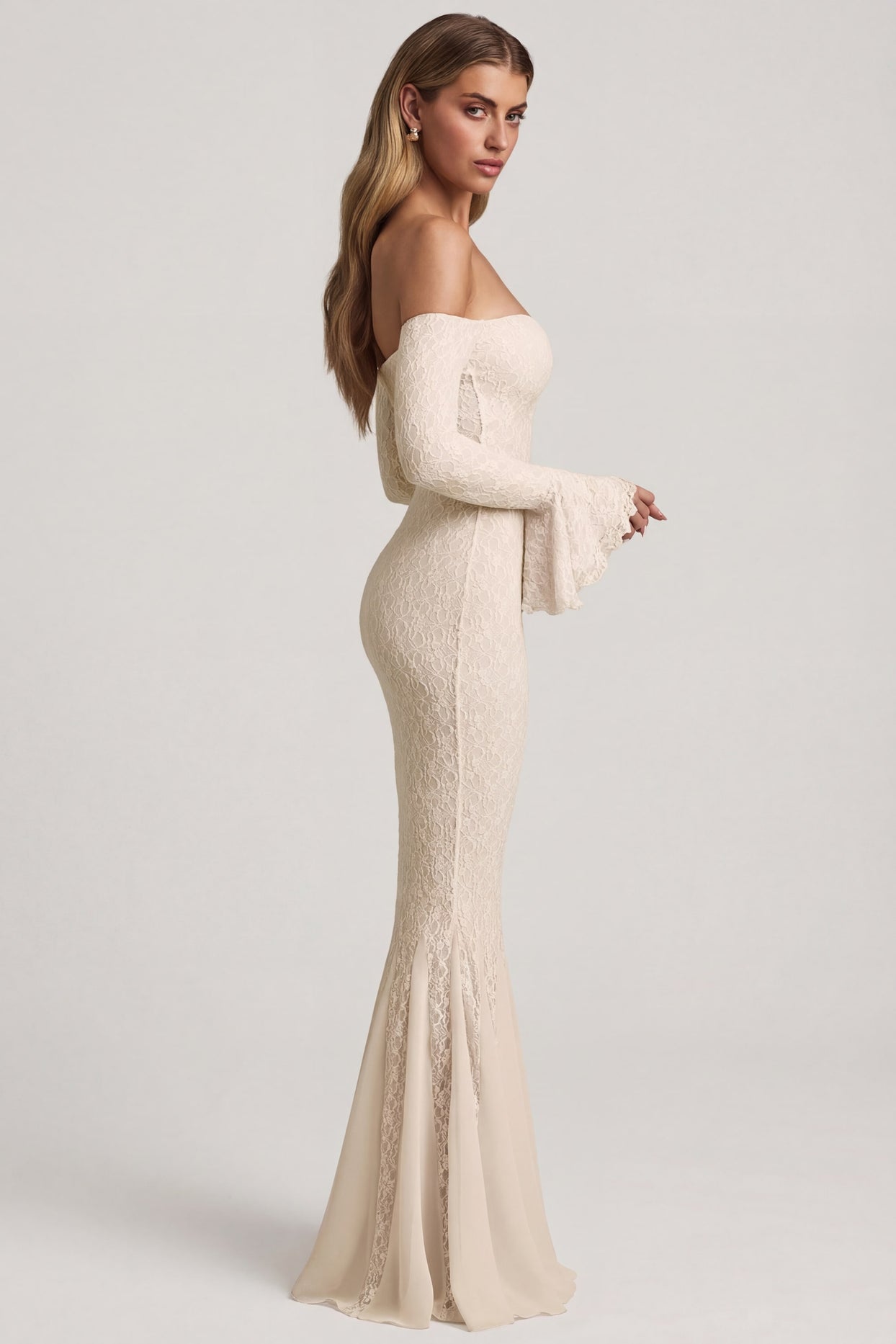 Oh Polly's Freya Tidy wearing the Verena Maxi Dress in Ivory Stretch Lace fabric perfect for summer garden parties