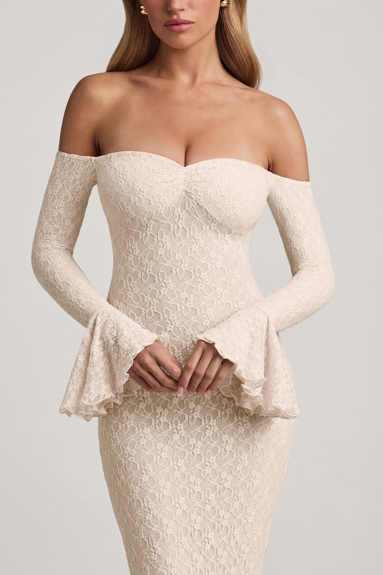 Oh Polly's Freya Tidy wearing the Verena Maxi Dress in Ivory Stretch Lace fabric perfect for romantic date nights