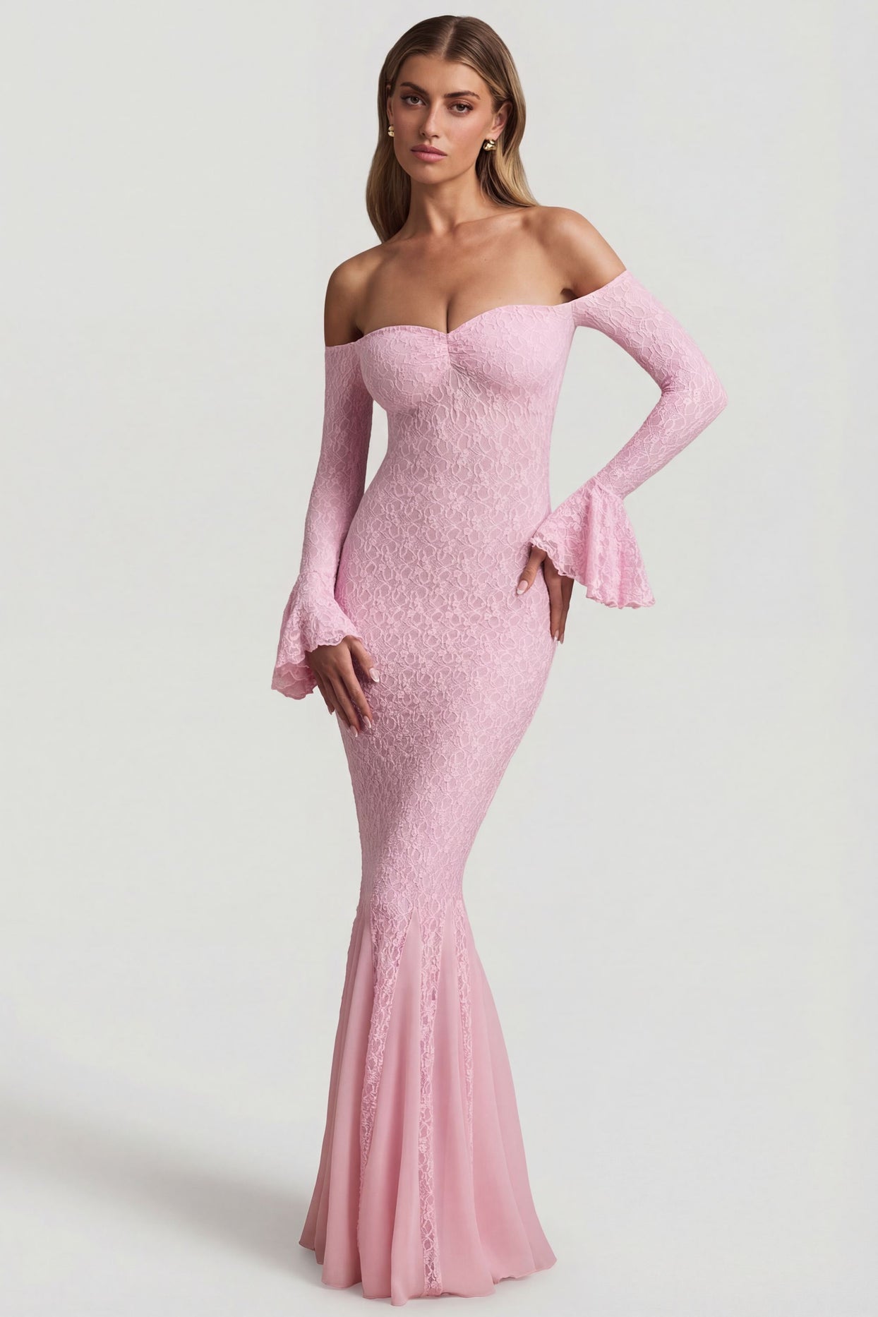 Oh Polly's Freya Tidy wearing the Verena Maxi Dress in Soft Pink Stretch Lace fabric perfect for romantic date nights
