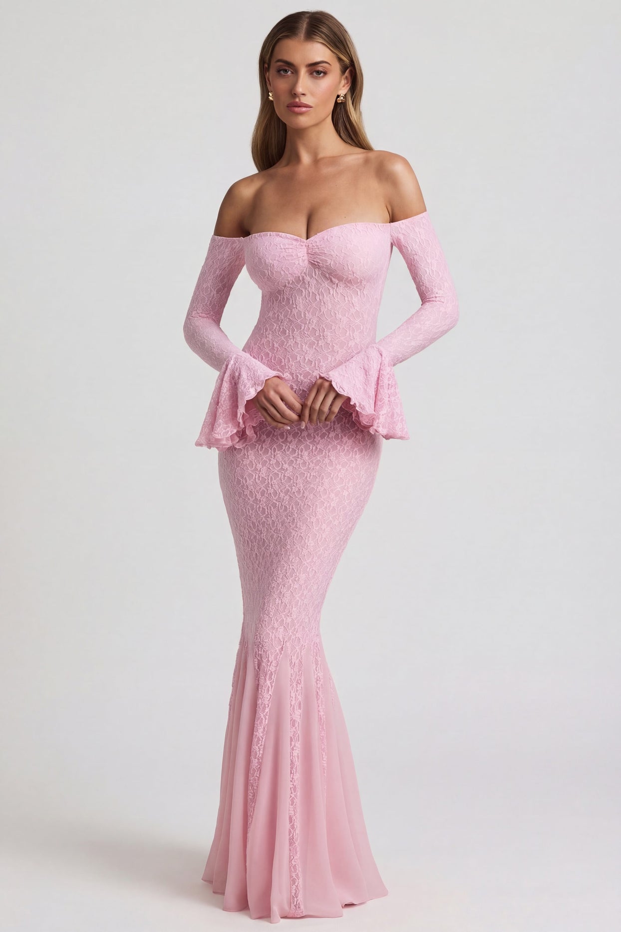 Oh Polly's Freya Tidy wearing the Verena Maxi Dress in Soft Pink Stretch Lace fabric perfect for spring weddings